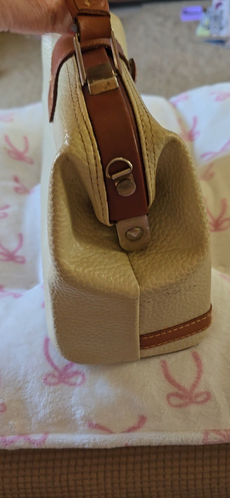 Dooney And Bourke Vintage all weather leather purse. 11 inches across and 7 t