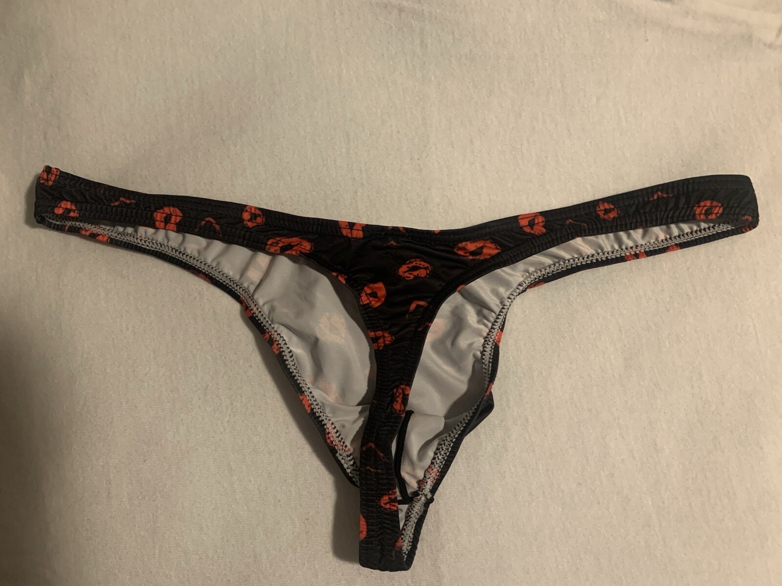 Mens Kiss Pattern Black Thong. Size XL (See Details)