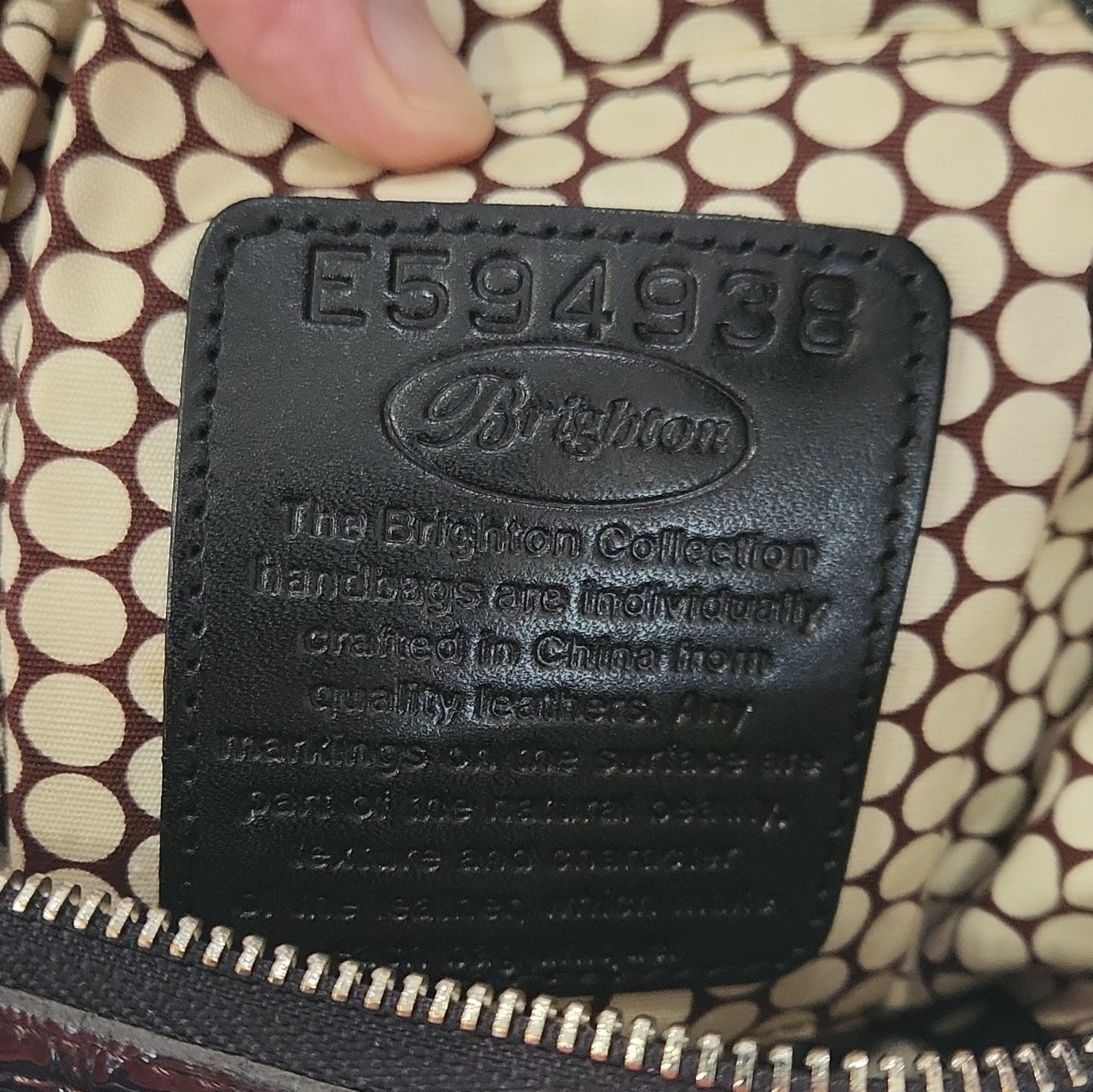 Brighton Black Crossbody Bag, Adjustable Strap, Zip, Pockets, Charm
