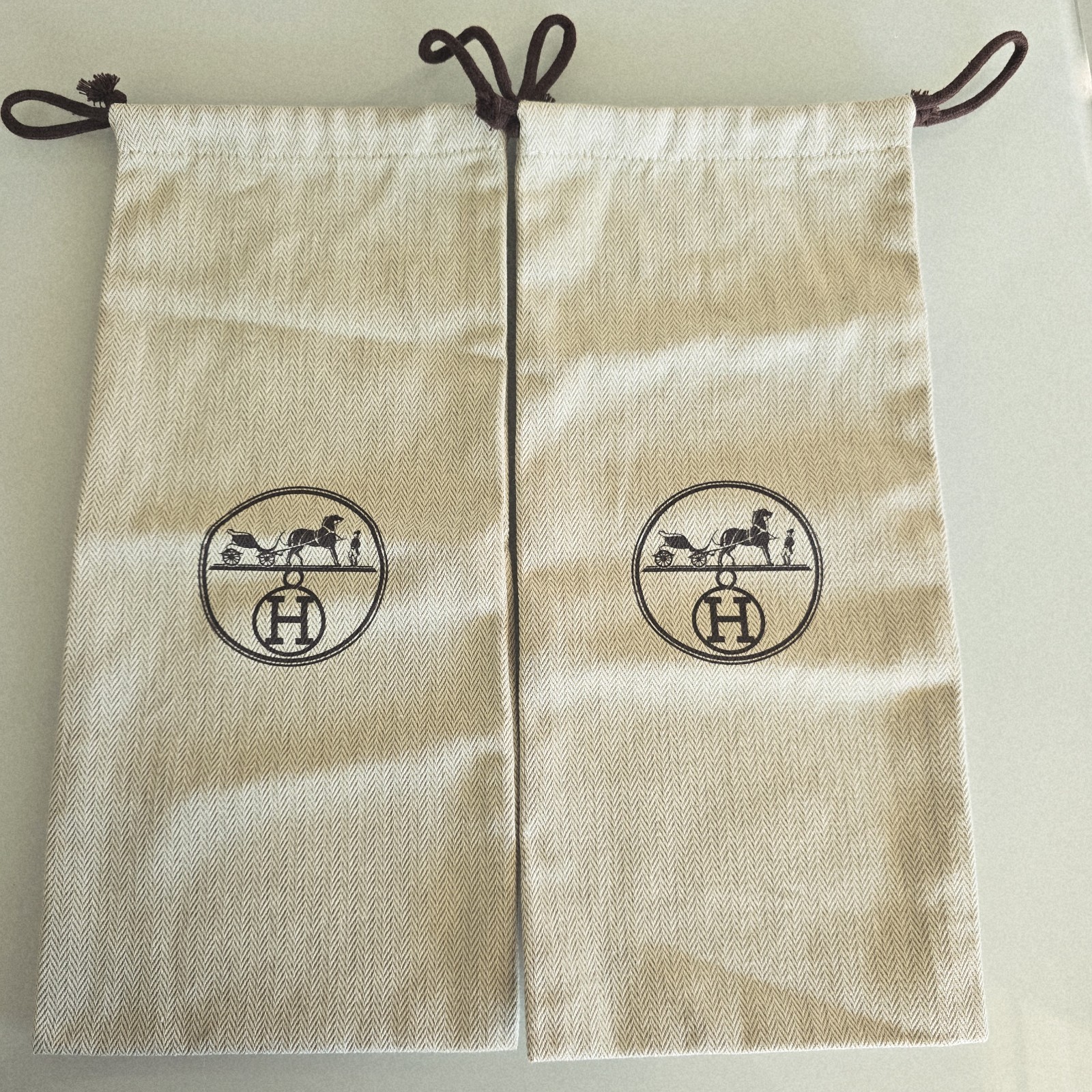 Hermès Set of 2 Beige Drawstring Dustbags with Logo Accent Designer 14×6.25in