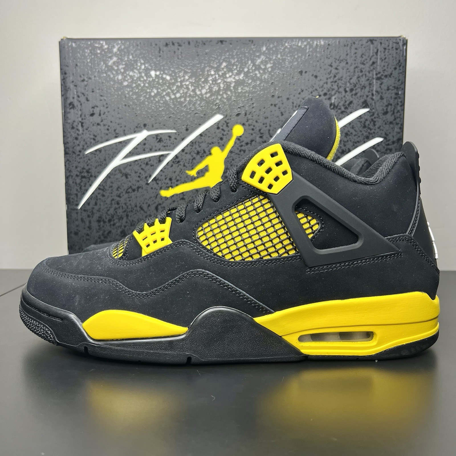 Size 12 – Jordan 4 Retro Mid Thunder