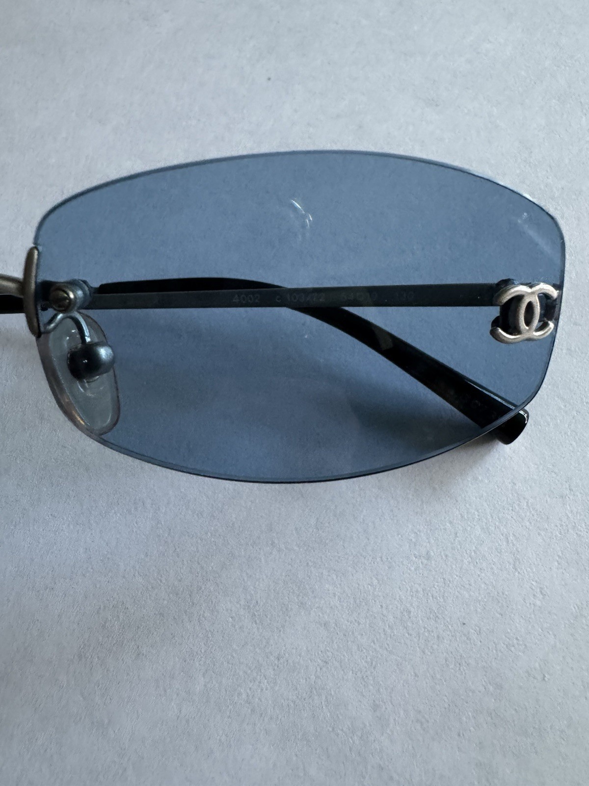 Vintage CHANEL 4002 Rimless Sunglasses Tinted Blue Lenses Silver Metal Frame