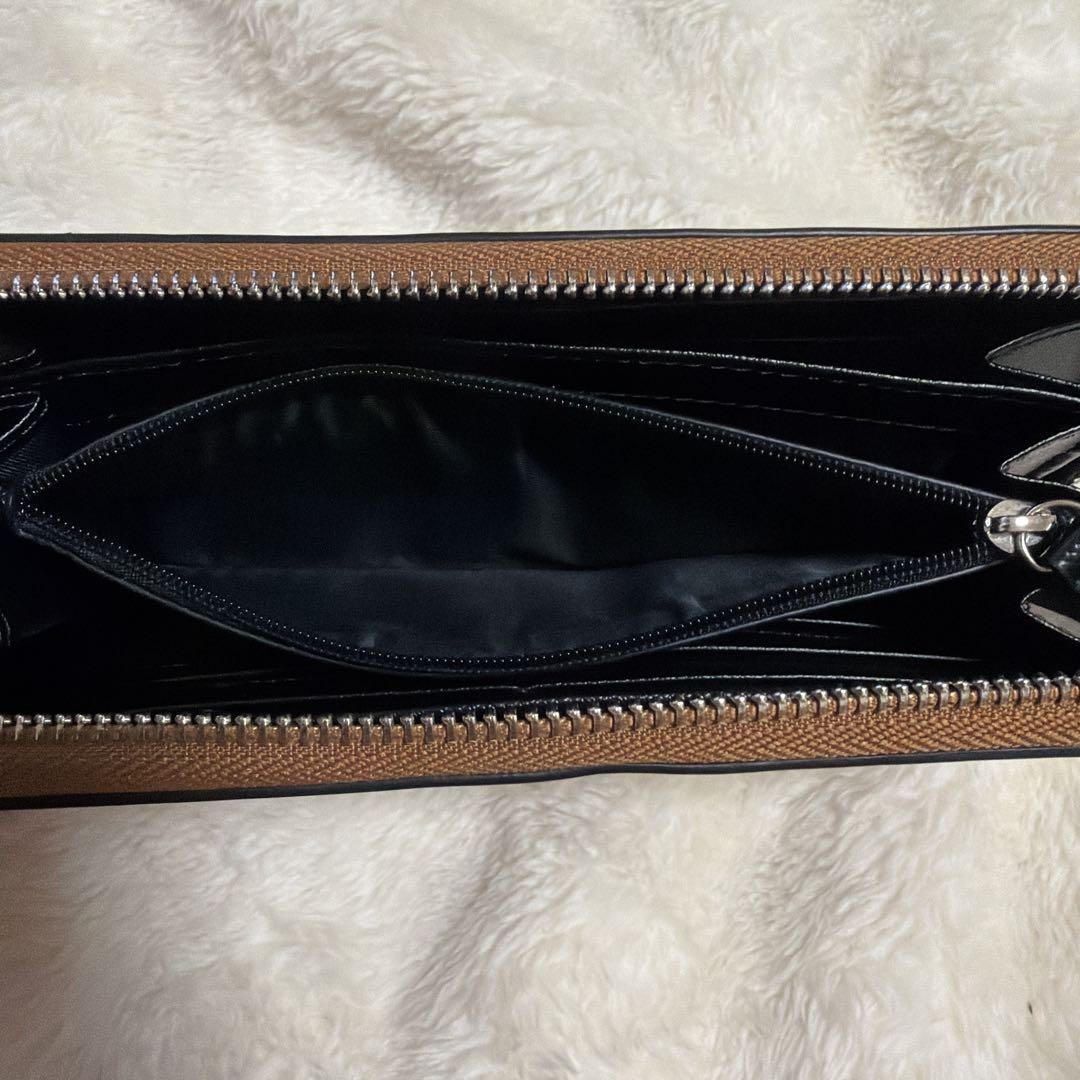 Excellent Condition Coach Peanuts Snoopy Collaboration Leather Round Zip Long Wa