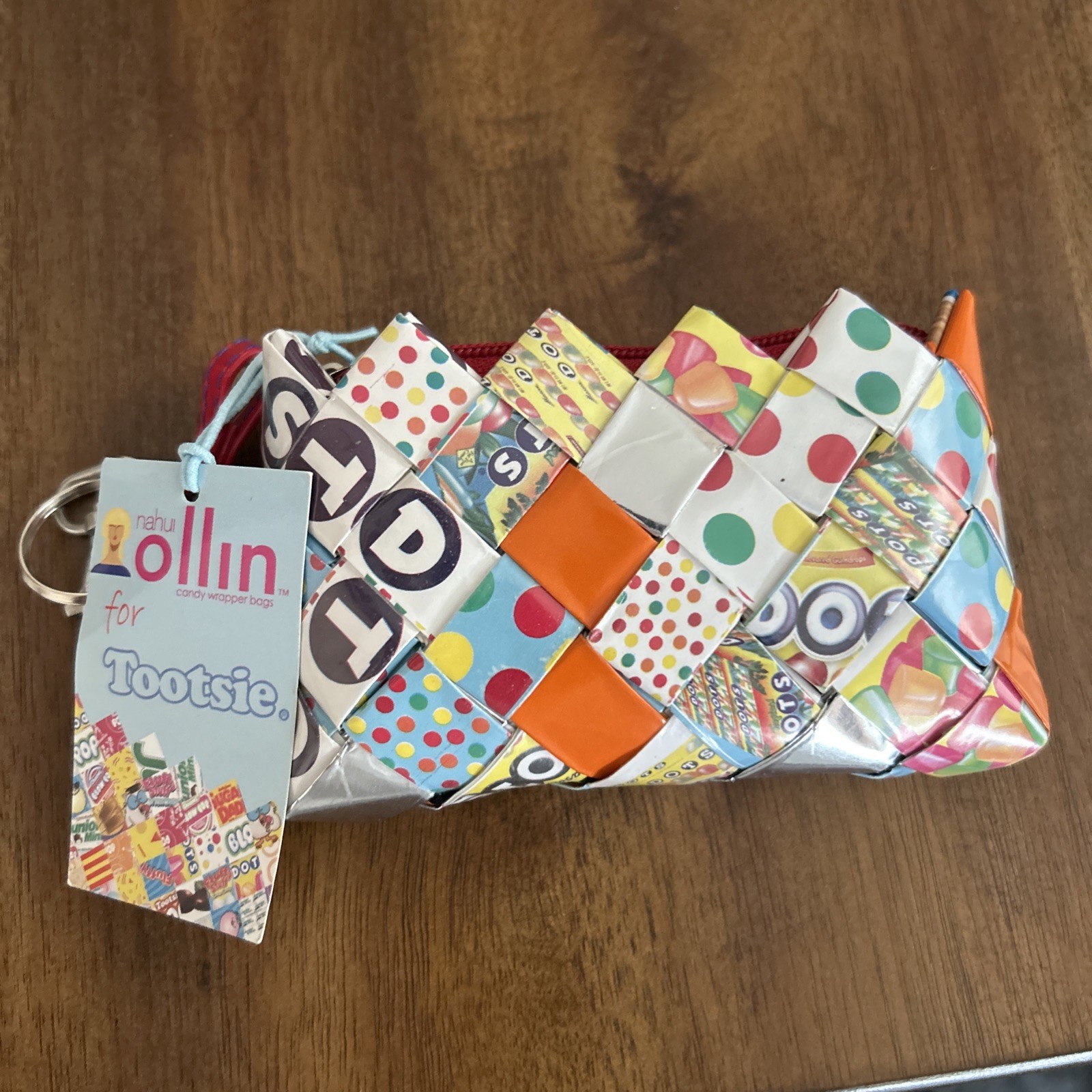Nahui Ollin for Tootsie woven wristlet clutch made using upcycled candy wrappers