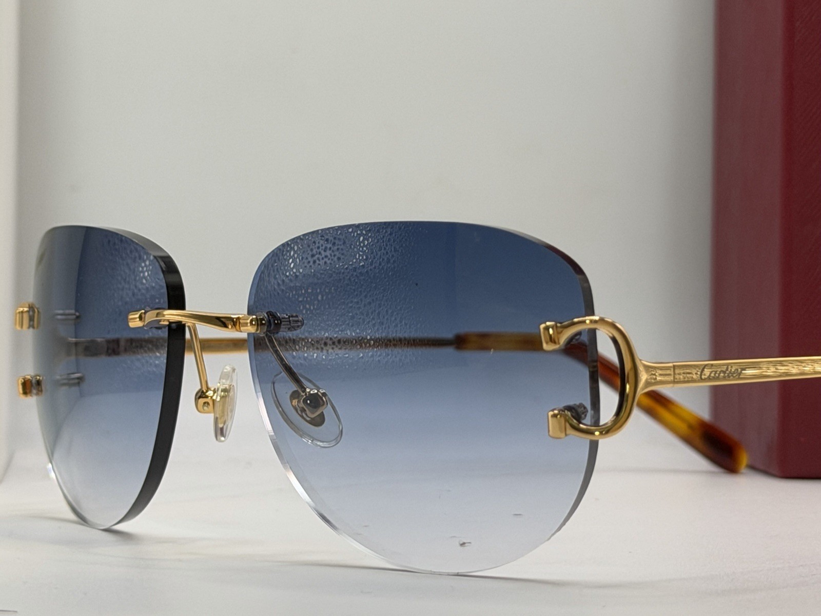 Cartier Rimless Oval Gradient Blue Unisex Gold C Wire Sunglasses CT00920