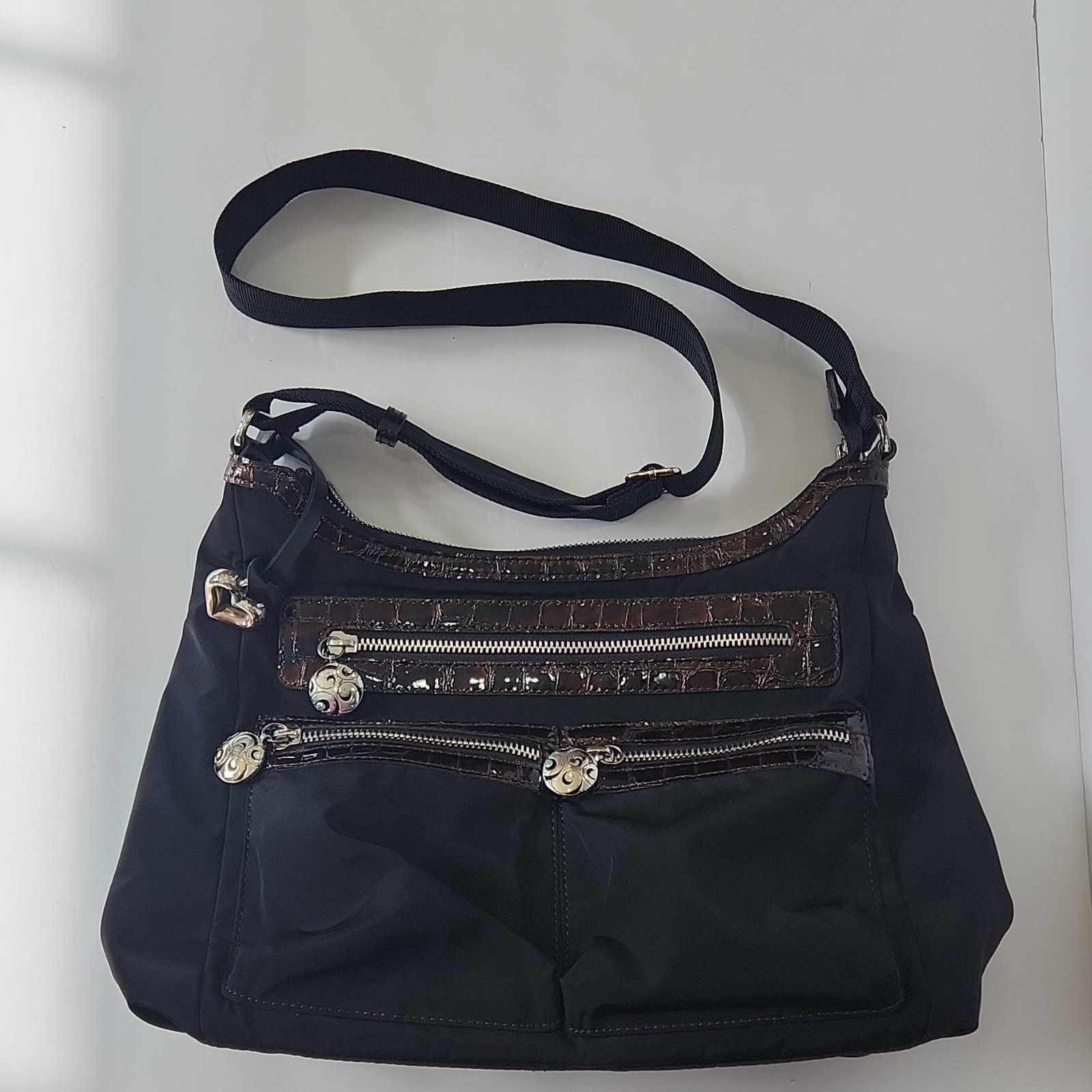 Brighton Black Crossbody Bag, Adjustable Strap, Zip, Pockets, Charm