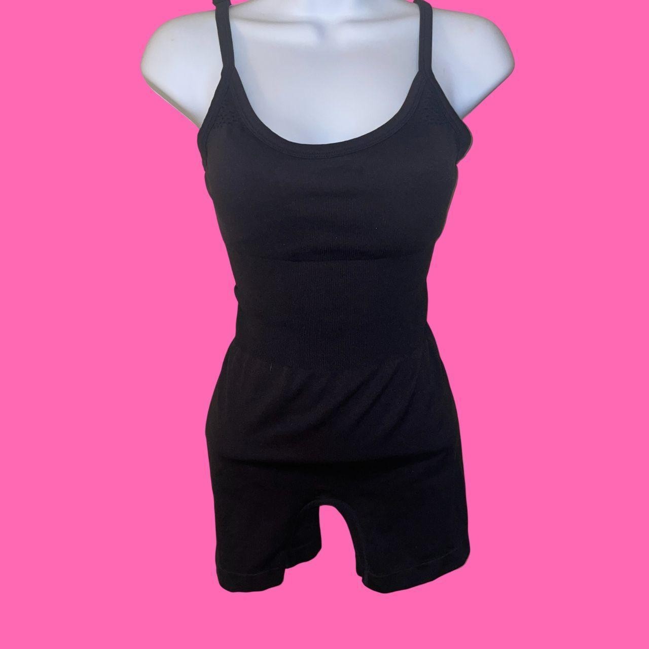 black Avia Women’s Body Mapping Mesh Romper features a U-neckline size small