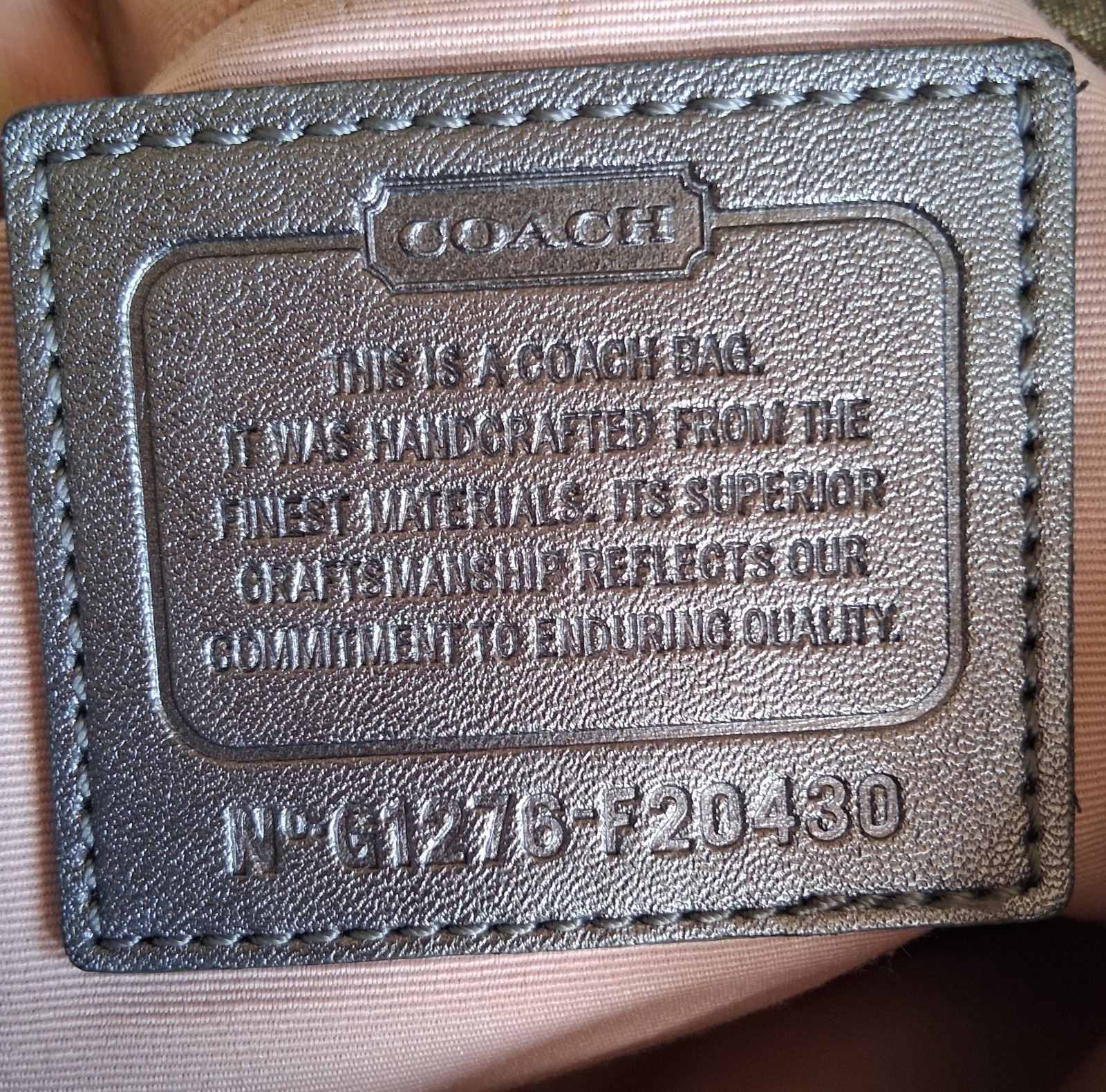 Gray Signature Coach