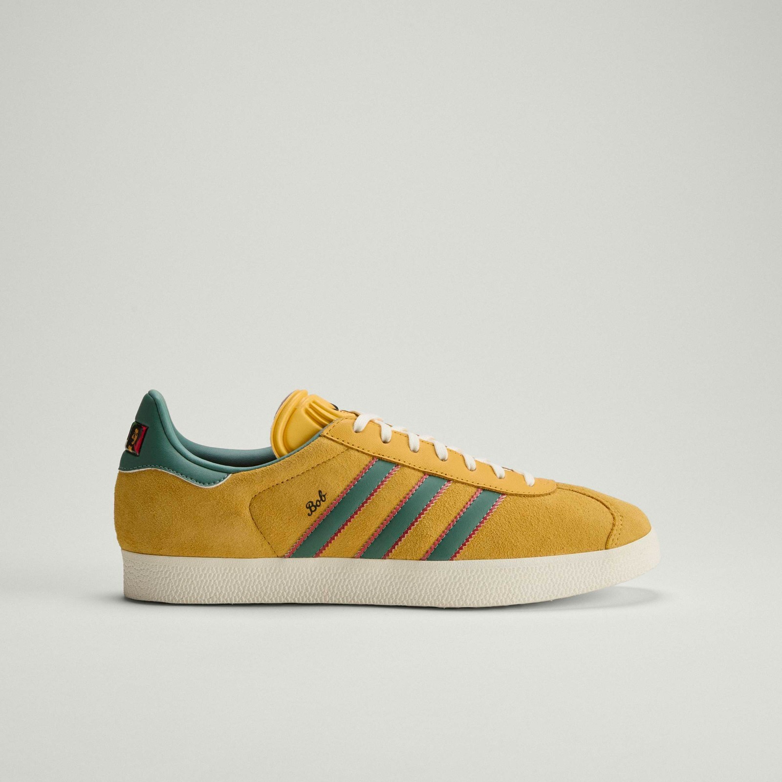 Adidas Men’s Gazelle Jamaica x Bob Marley Shoes Bold Gold/None/Pure Ruby KJ3532