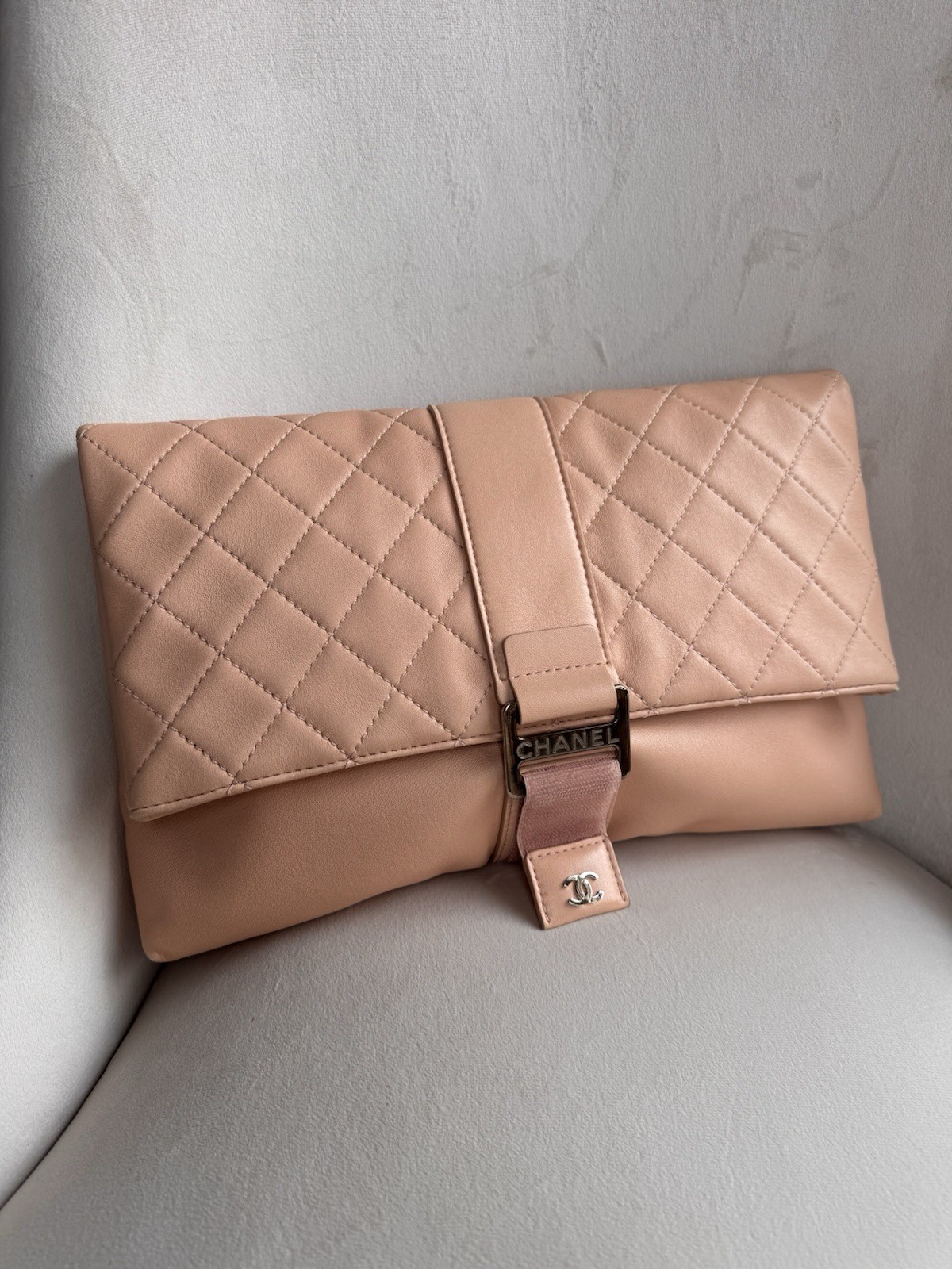 CHANEL Beige Quilted CC Logo Buckle Clutch Silver Hardware Inner Zipper