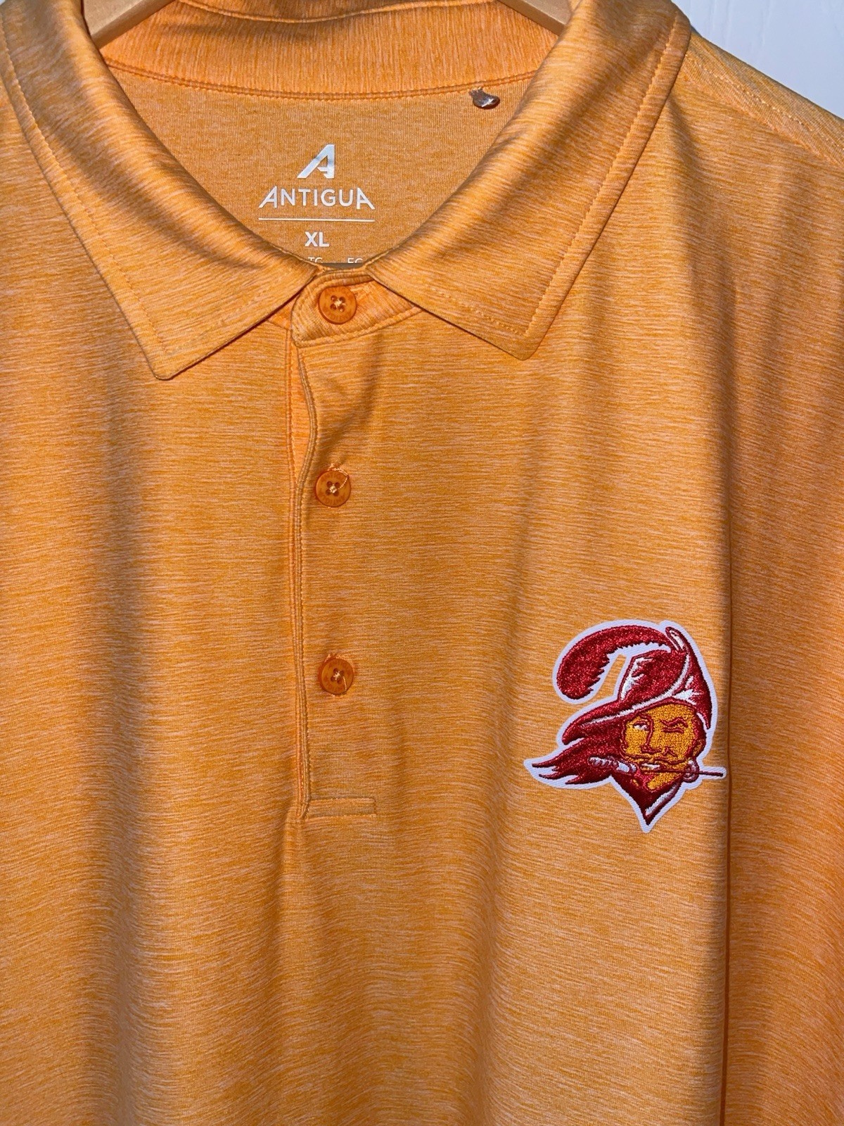 Antigua Men’s Orange Heather Polo with Embroidered Team Crest