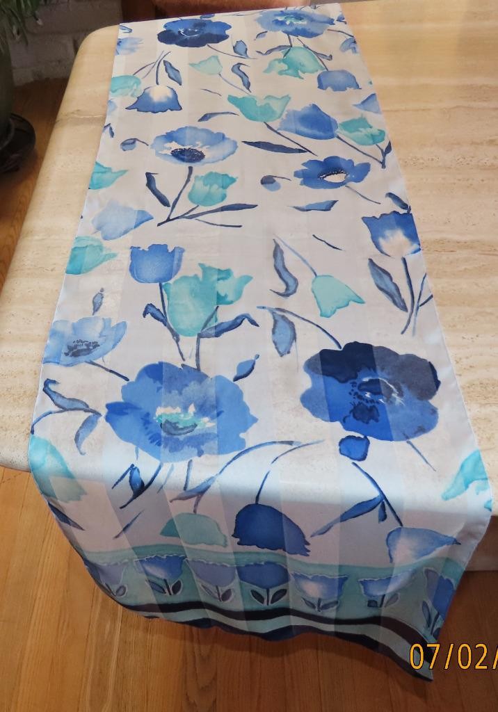 Oblong floral scarf; blue tones, white; 60×14.5 in. Semisheer; poly blend?