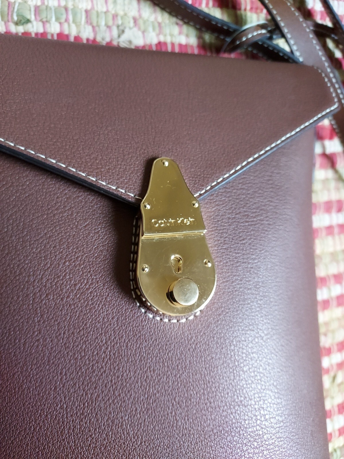 Calvin Klein Brown Lock Bucket Crossbody Bag