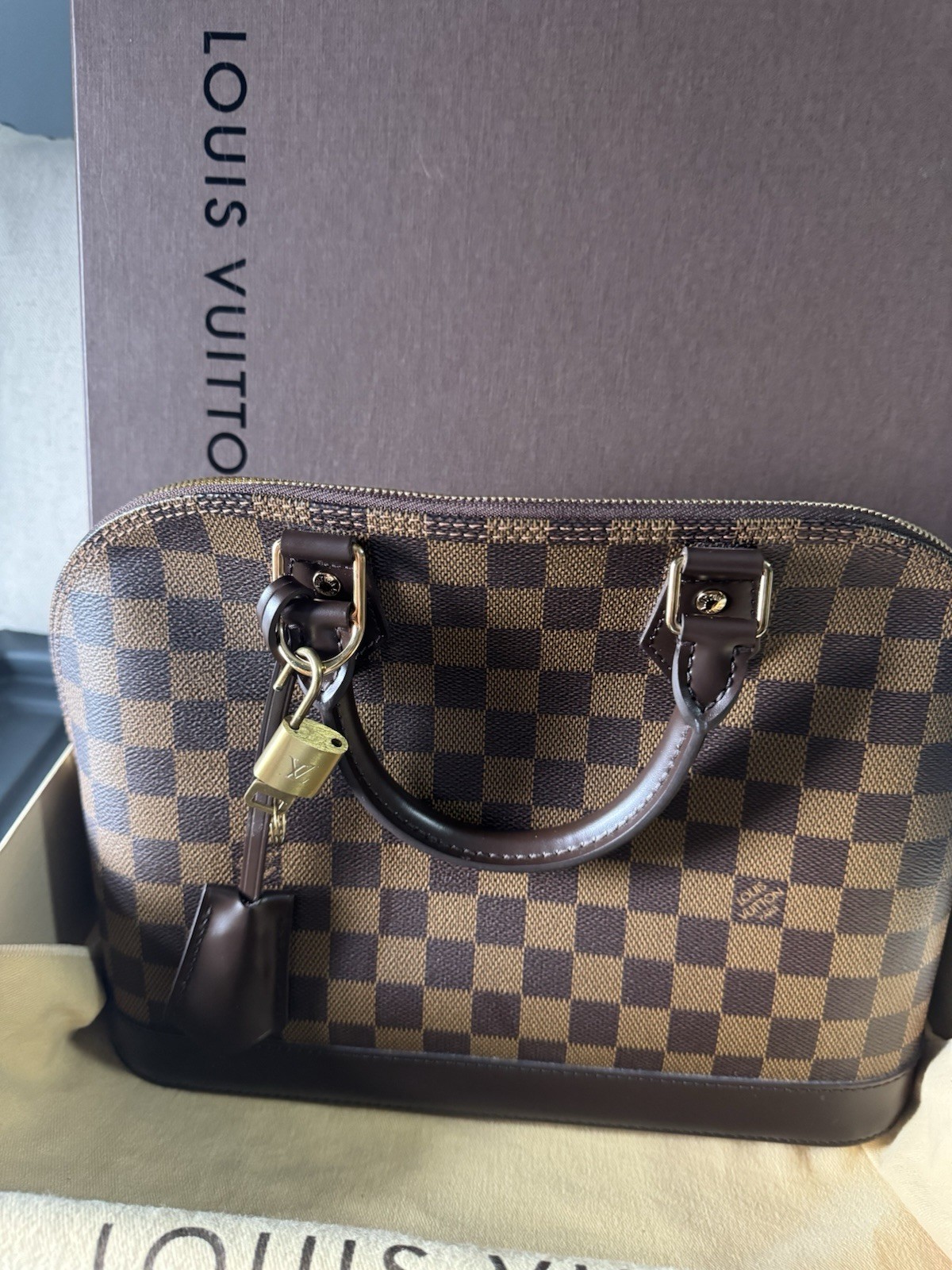louis vuitton damier ebene alma pm