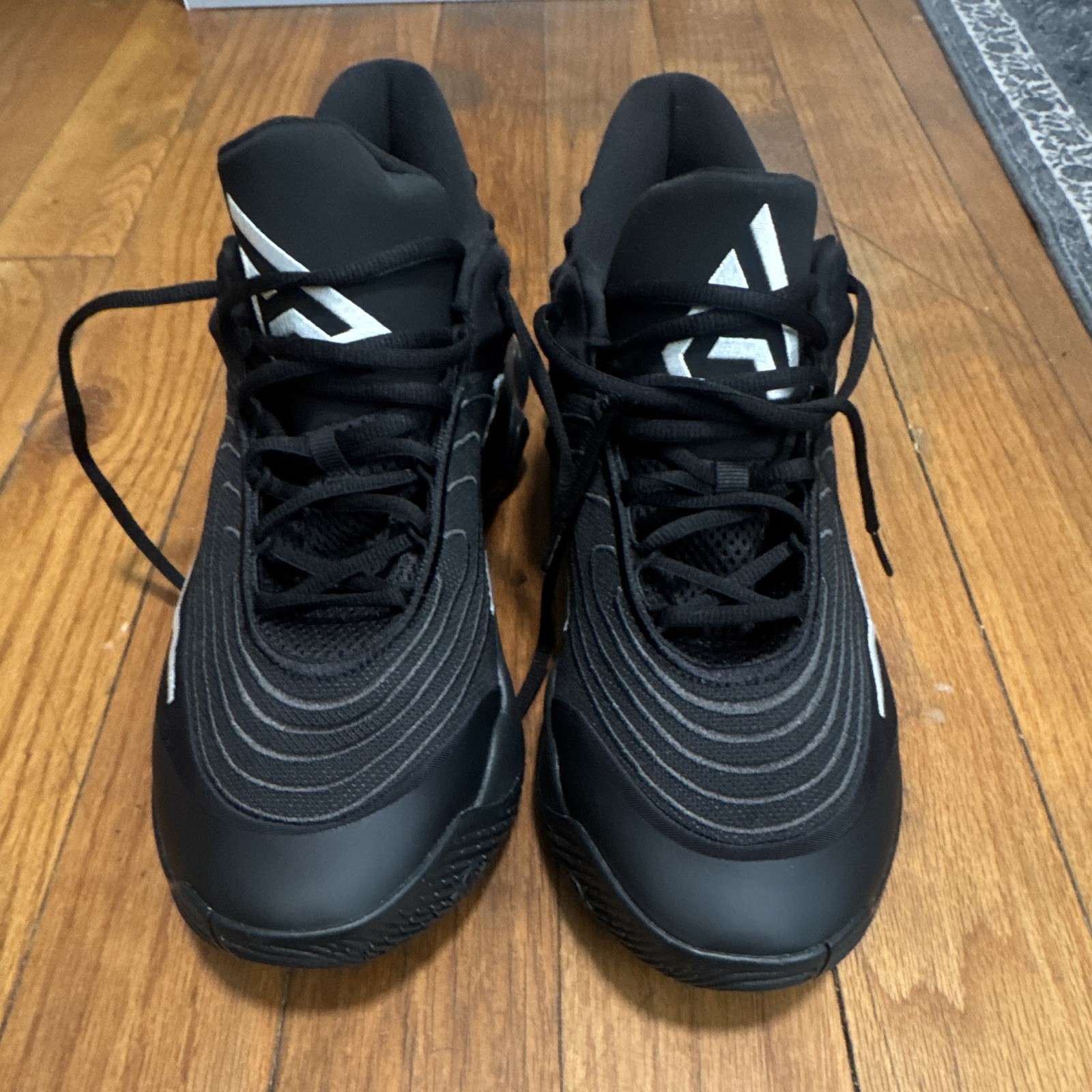 Nike Giannis Immortality 4 Black/White Men’s Basketball Mid-Top Mesh FQ3680-005