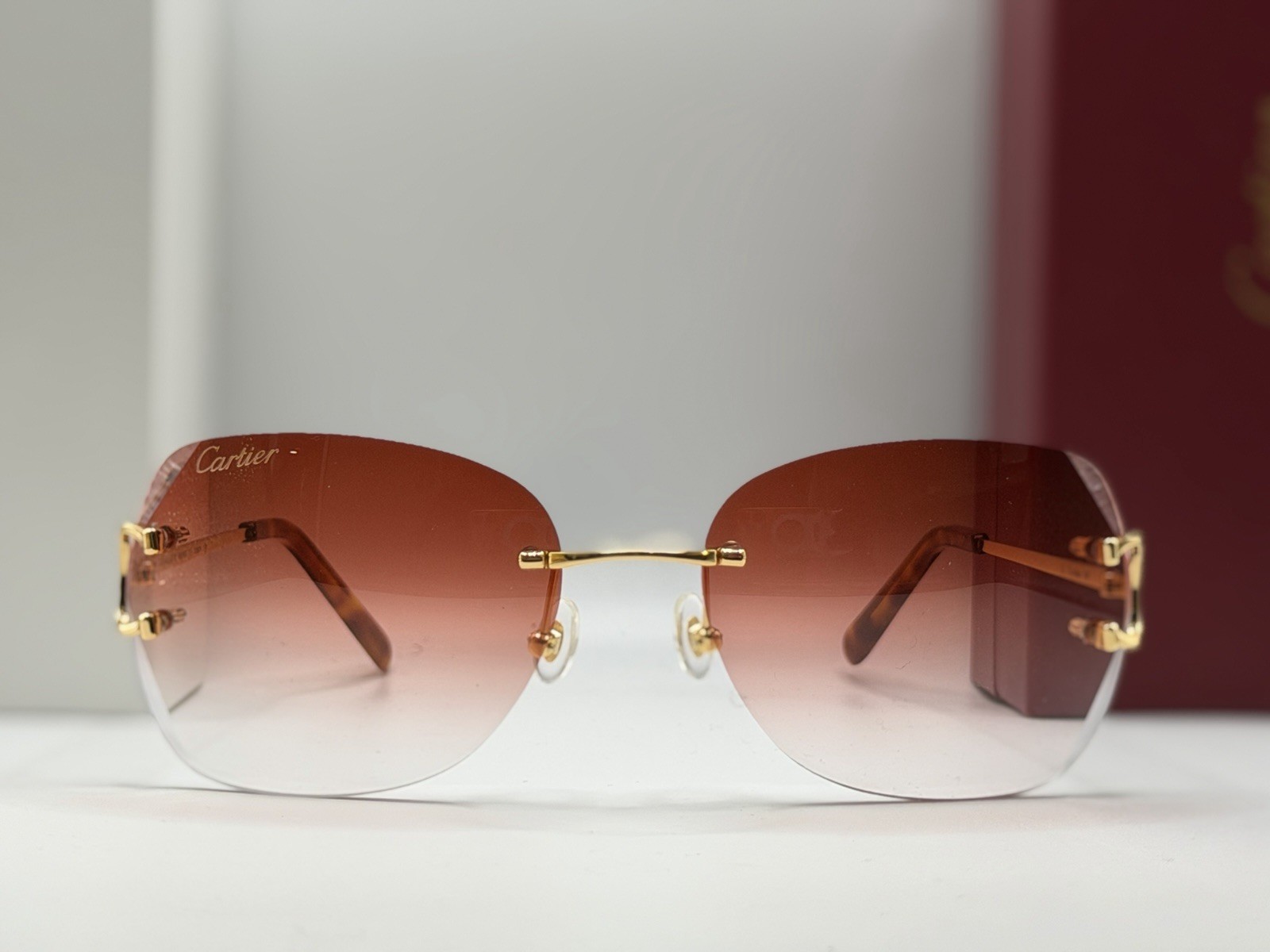 Cartier Rimless Square Gradient Red Unisex Sunglasses Gold Metal Frame CT00920