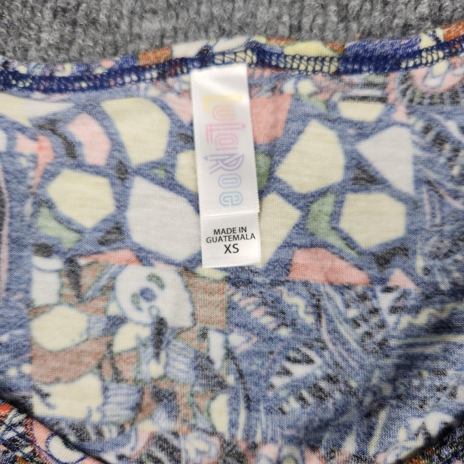 LuLaRoe Classic T Womens XS Blue Yellow Floral Geometric Patchwork High Low Top