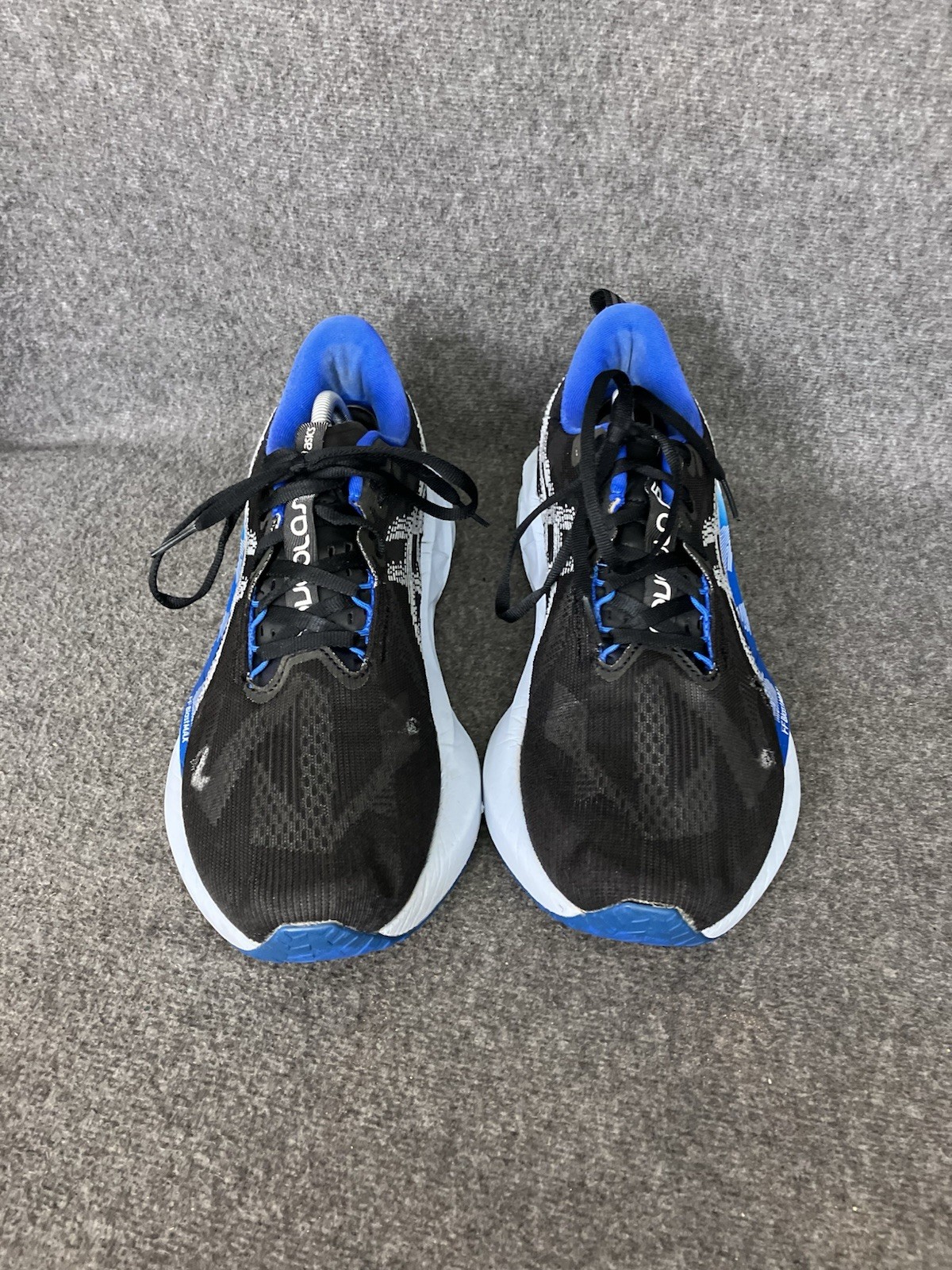 ASICS Novablast 5 Mens 11 Black Blue Running Shoes Sneakers HOLES