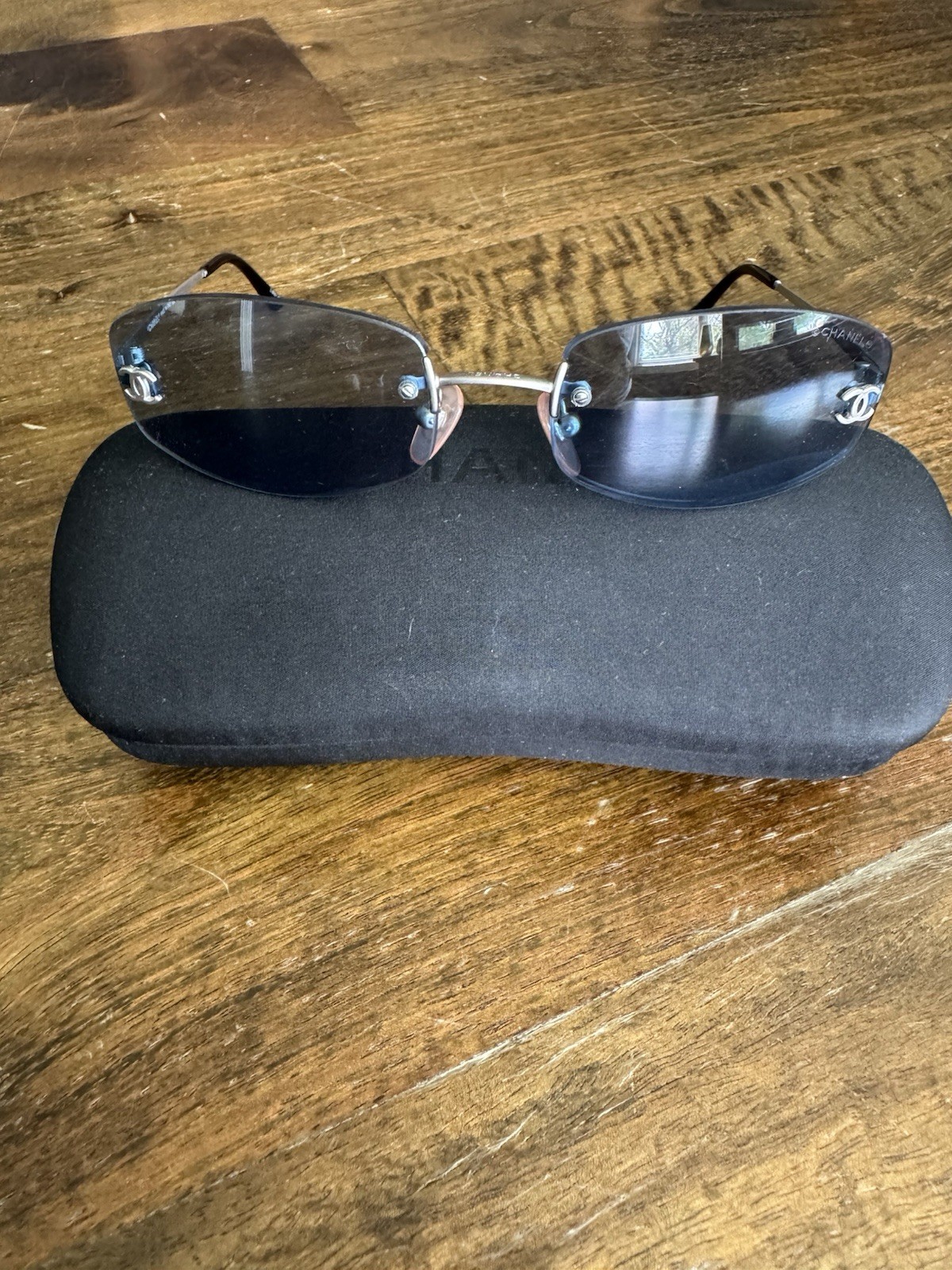 Vintage CHANEL 4002 Rimless Sunglasses Tinted Blue Lenses Silver Metal Frame