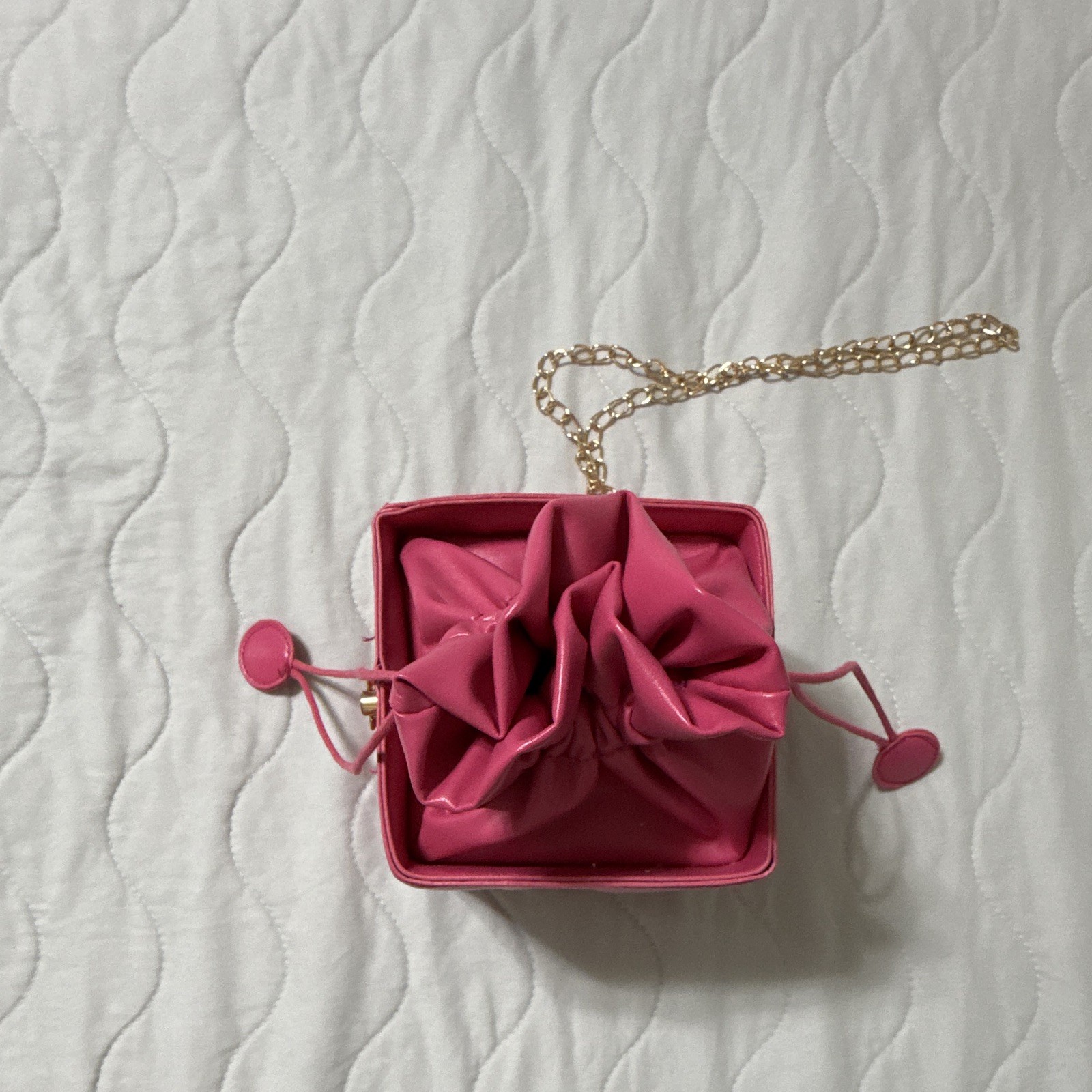 Pink Quilted Mini Crossbody Bag Drawstring Closure Gold Chain Detachable Strap