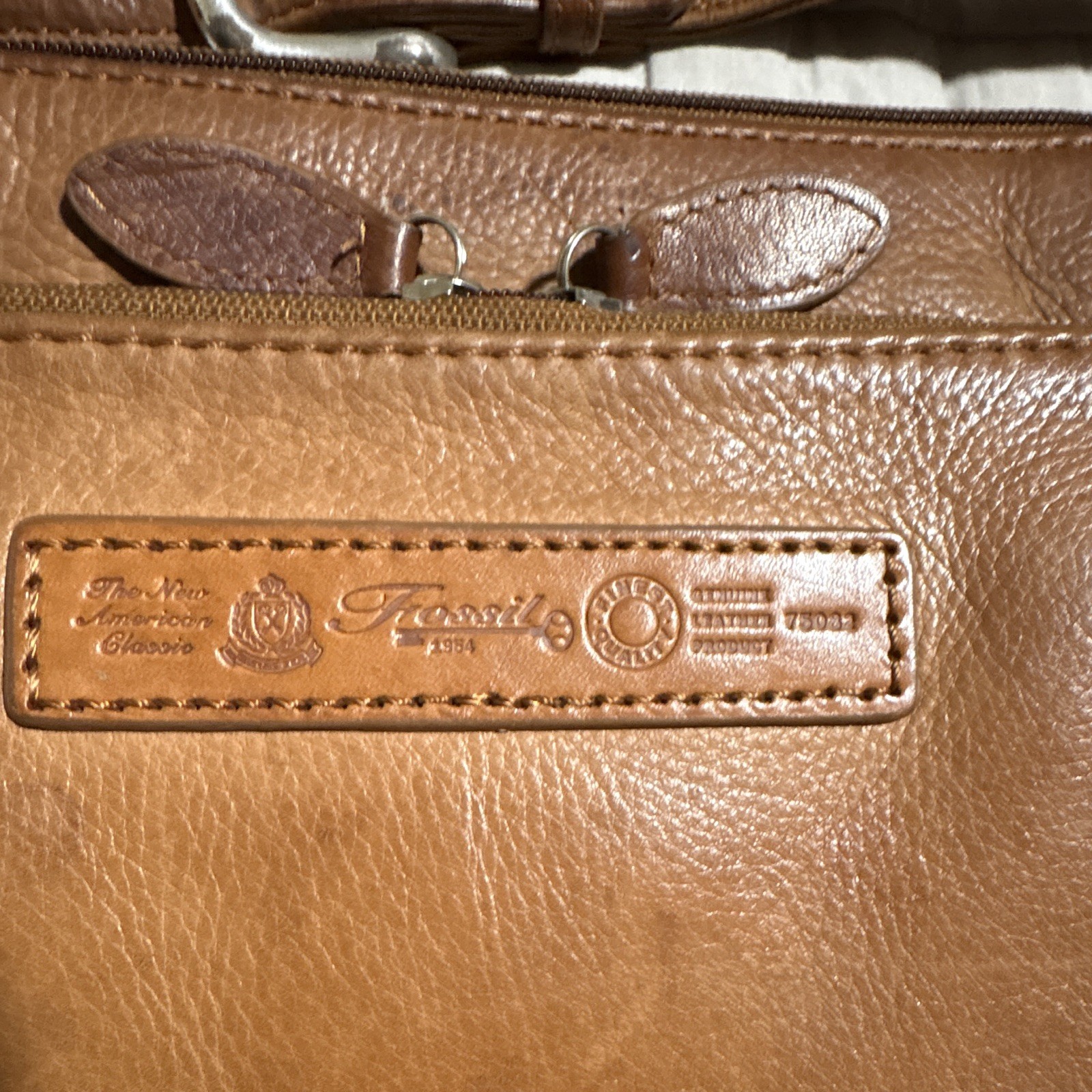 Fossil Brown Crossbody Bag Zip Closure Adjustable Strap Inner Pockets Lined