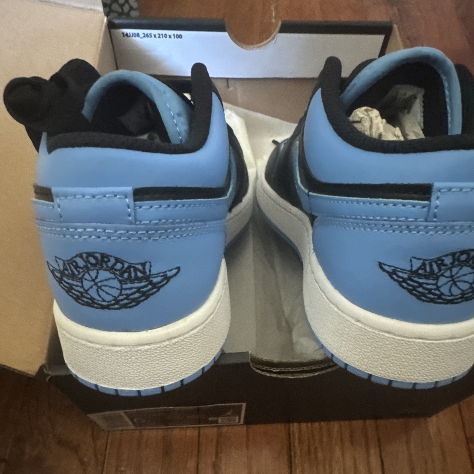 Jordan Air Jordan 1 Low Men’s Leather Sneaker Black/Blue Colorblock Lace-Up