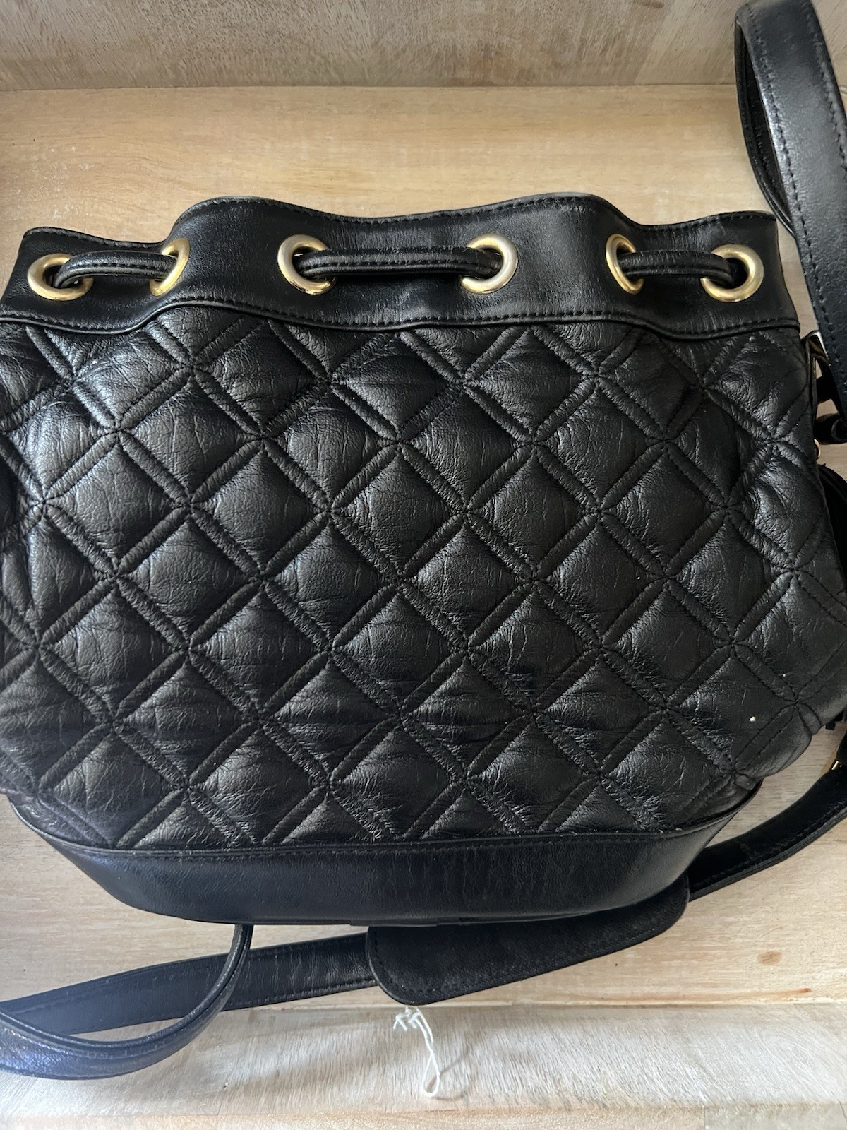 MCM Black Quilted Drawstring Bucket Shoulder Bag Tassel Logo Gold Hardware