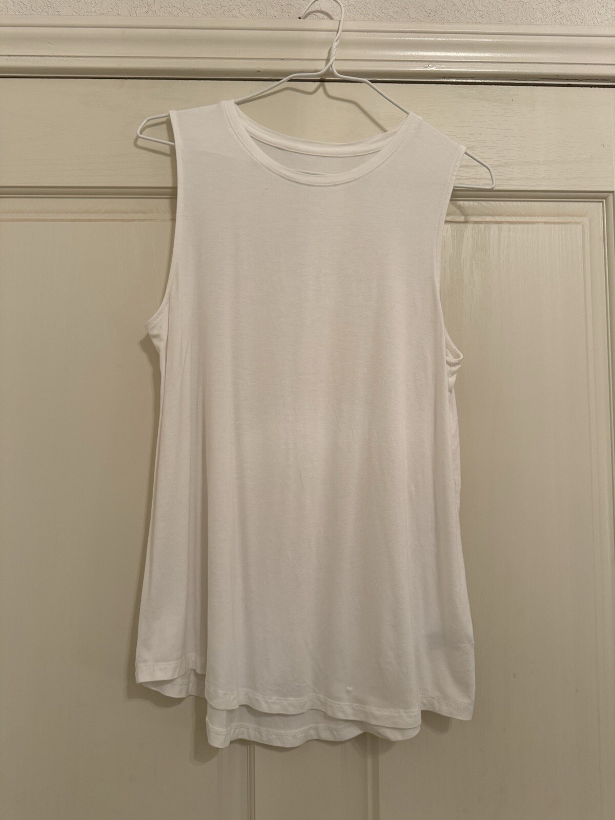 A New Day White Long Tank Medium. 95% Rayon 5% Spandex. A Line