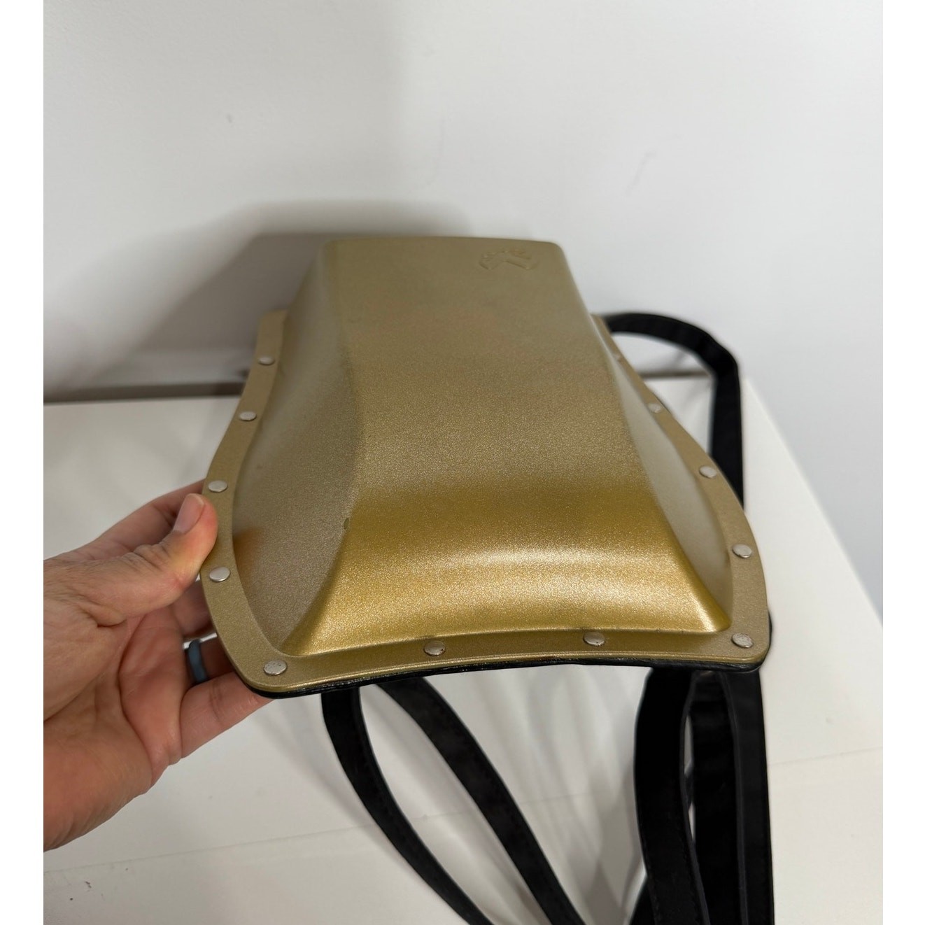 Boblbee Scarabée hard-shell mini backpack St Tropez model in metallic gold.