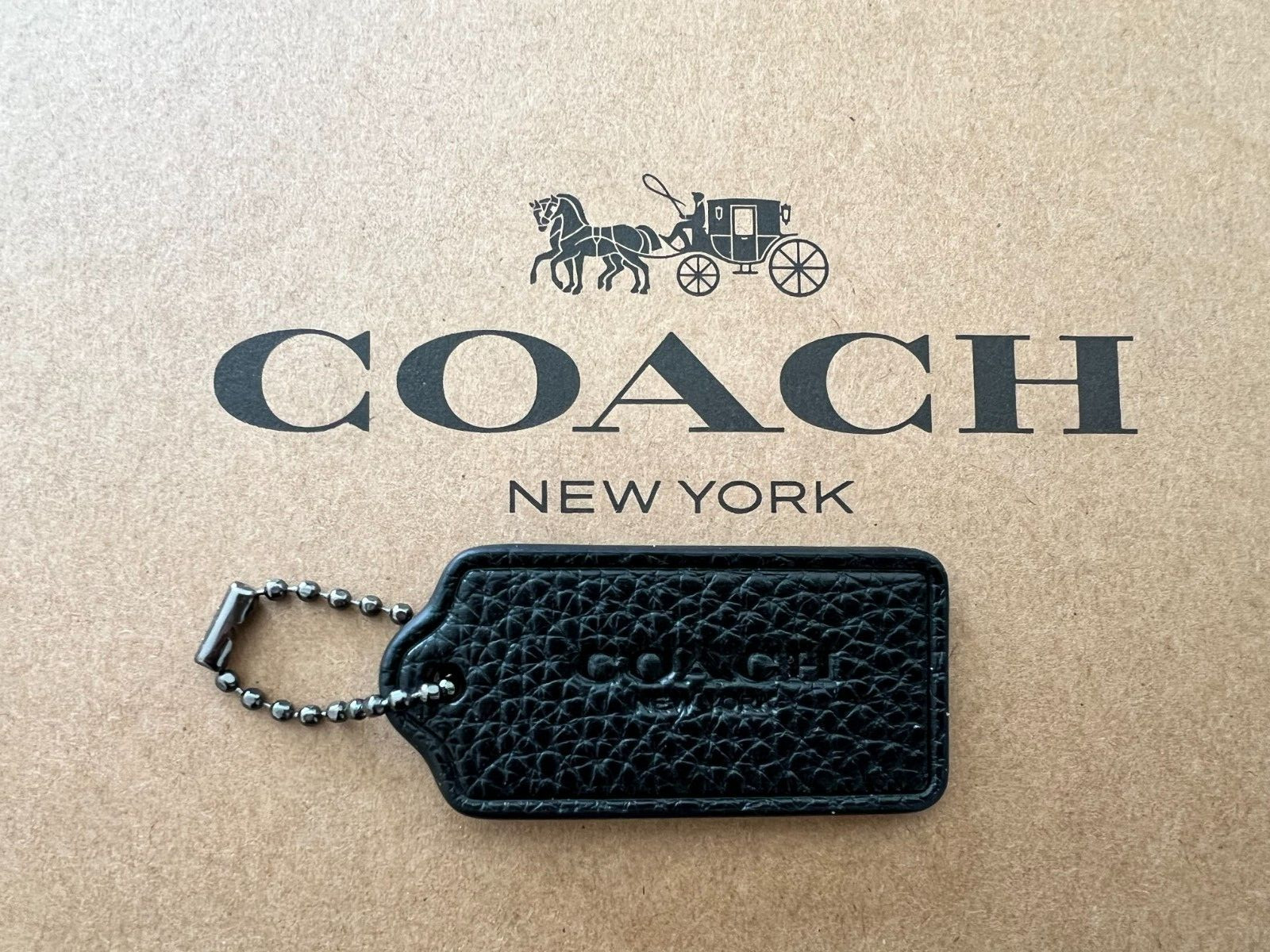COACH Logo New York Hang Tag Charm Purse with Chain in Pebble Leather 2” x 1″
