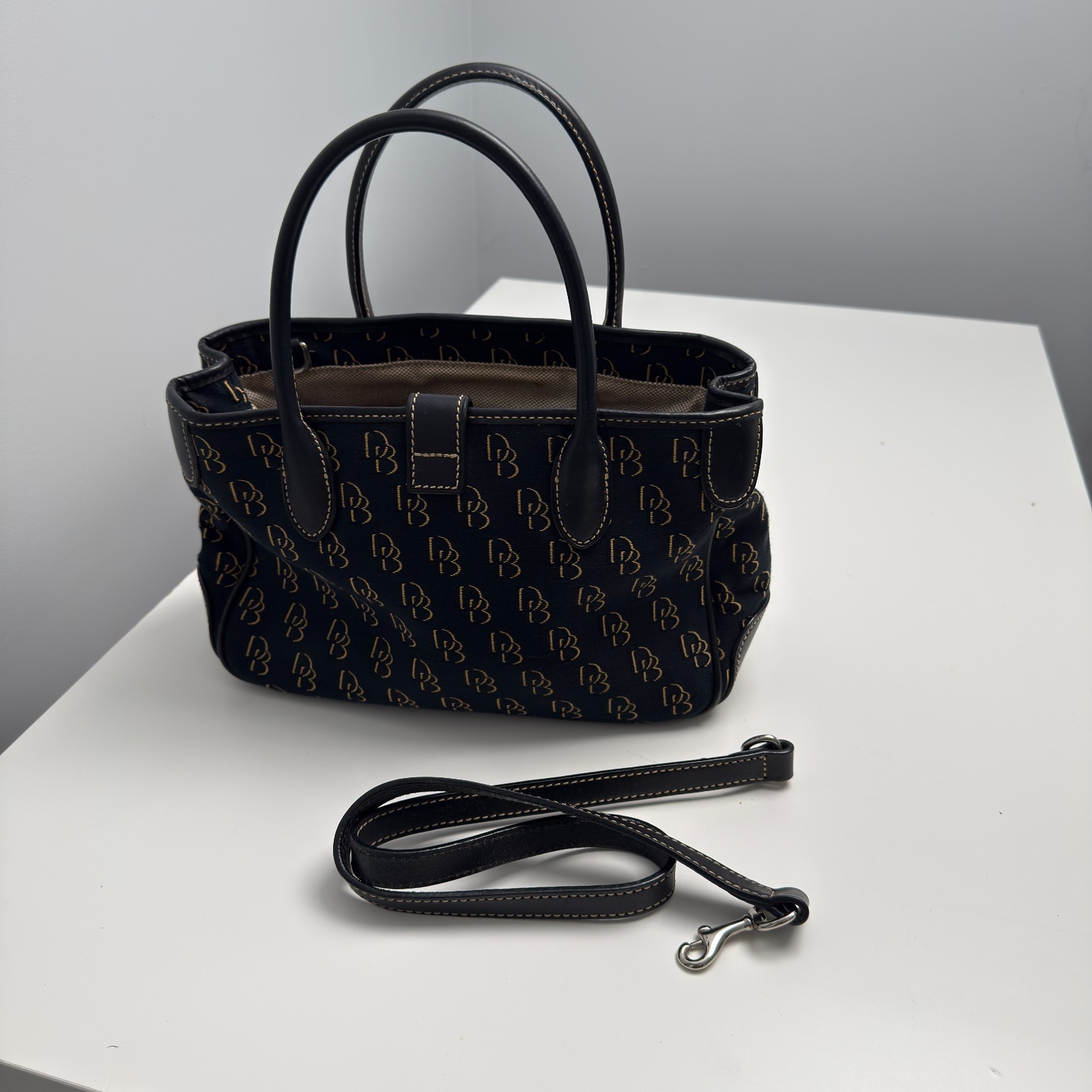 Dooney & Bourke DB Monogram Satchel Purse Black Gold Leather Trim Push Lock