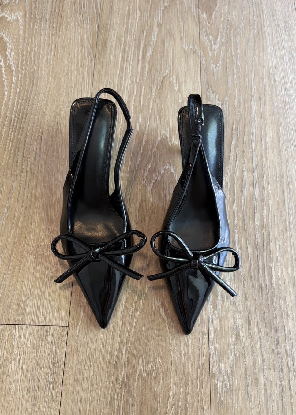 Black Patent Pleather Pointed-Toe Slingback Pumps w/ Bow Detail
