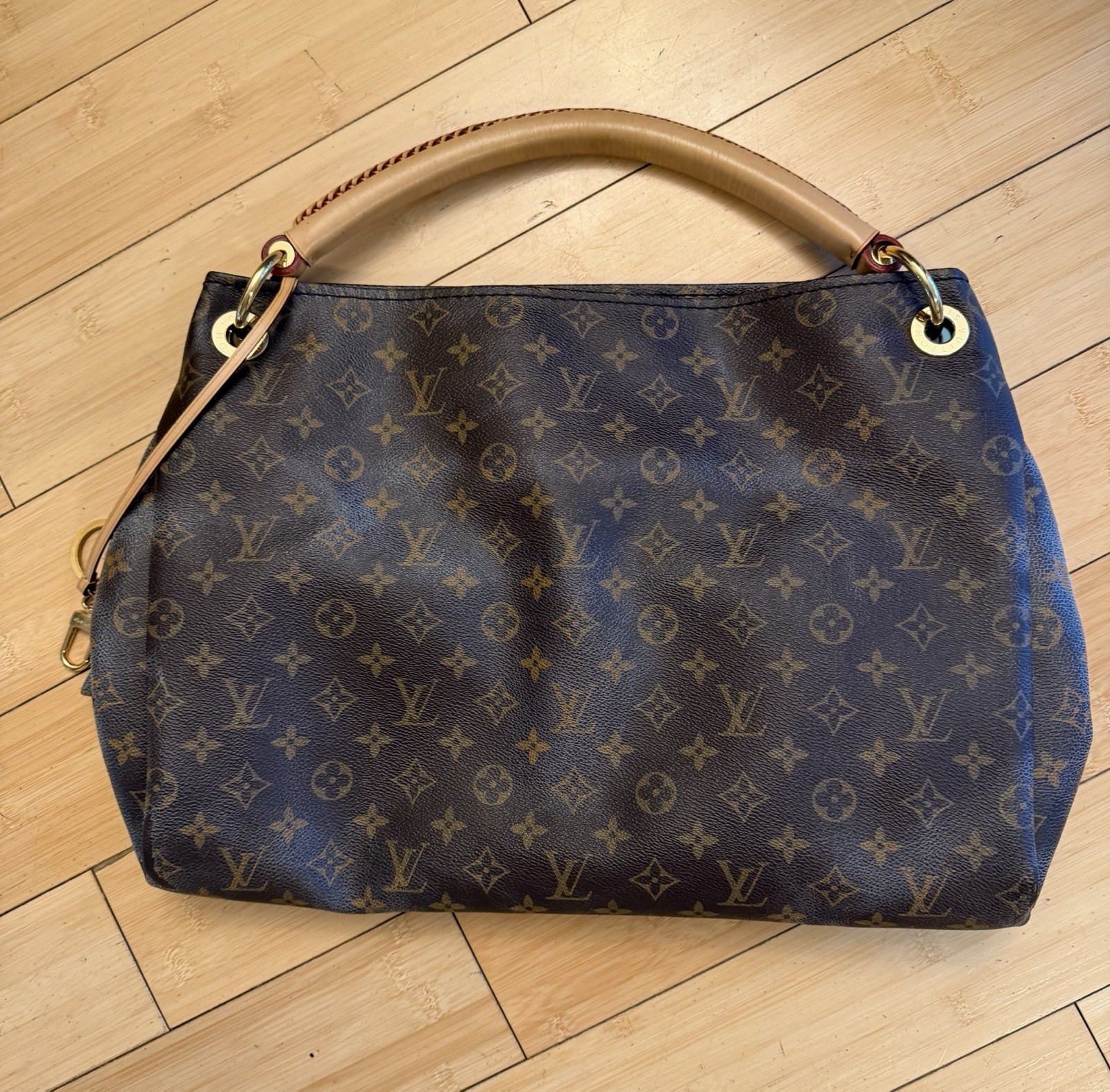 Authentic LOUIS VUITTON Monogram Artsy MM Shoulder Bag w/ original receipt.