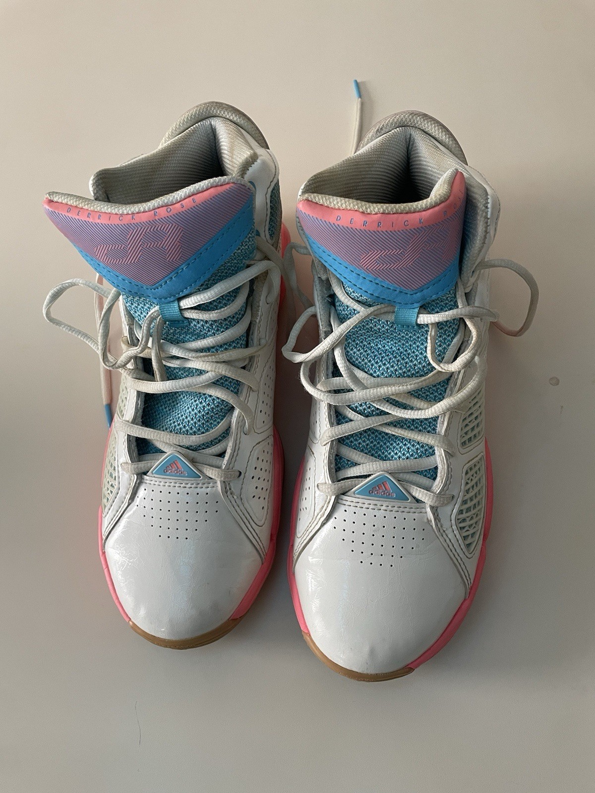 The Basketball Adidas Shoes With A Pink Color