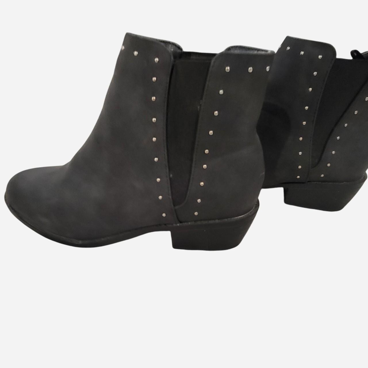 Ash-black ankle boots with subtle stud details