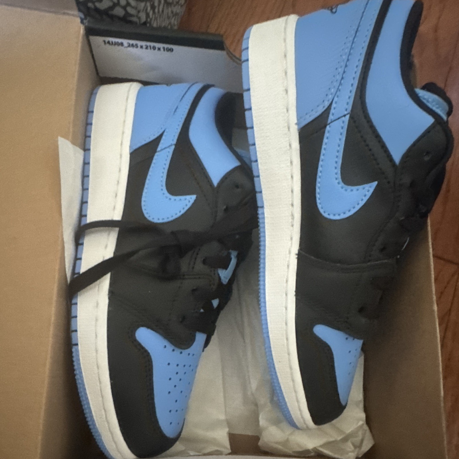 Jordan Air Jordan 1 Low Men’s Leather Sneaker Black/Blue Colorblock Lace-Up