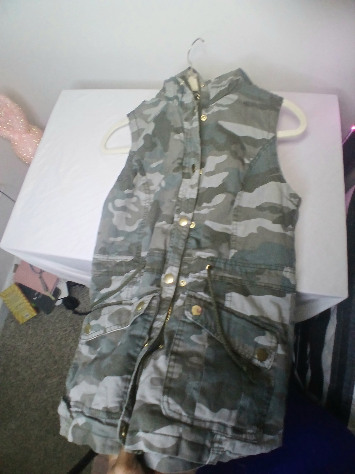 Cozy Y2K camo utility vest with soft sherpa lining and removable hood.