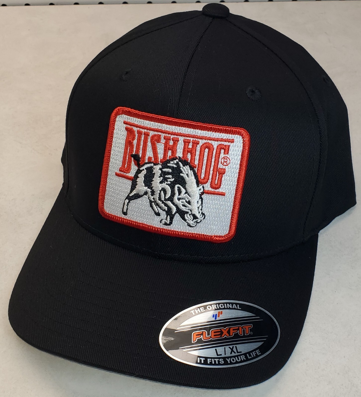 Bush Hog Patch on Flexfit 6277 Black Hat L/XL 7 1/8 – 7 5/8″