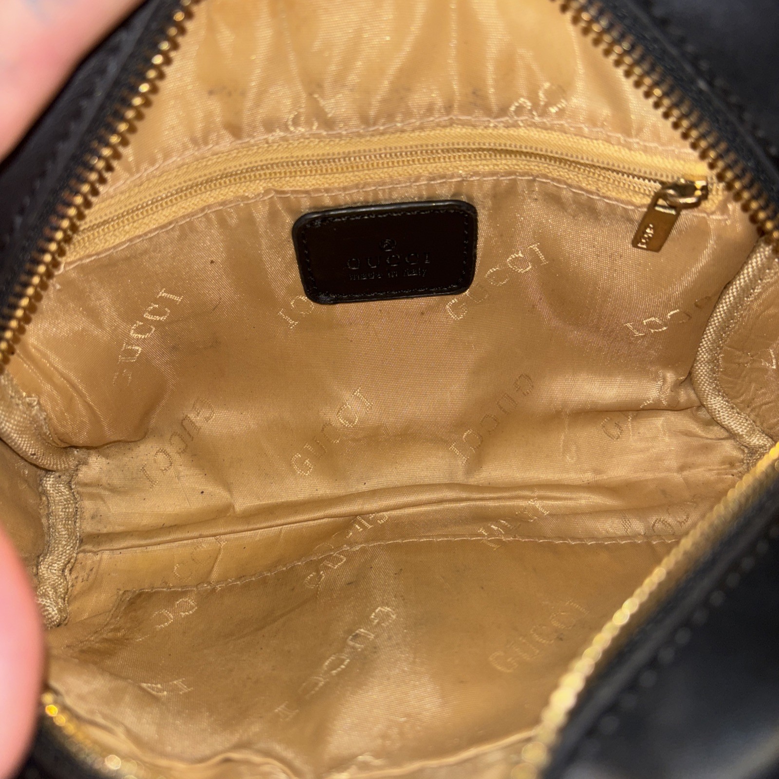 This is a Gucci GG Supreme Ophidia camera-style shoulder bag.