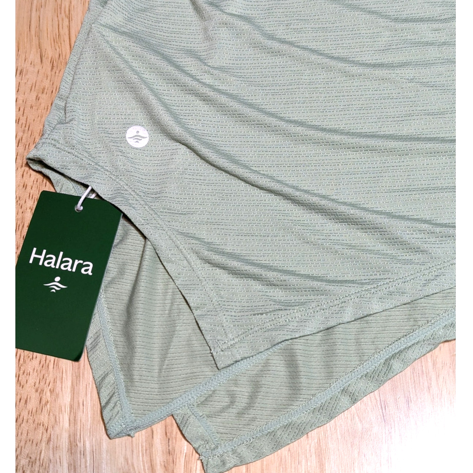 HALARA Sheer Jacquard Asymmetric Hem Top XS Quick Dry Workout NWT Light Green