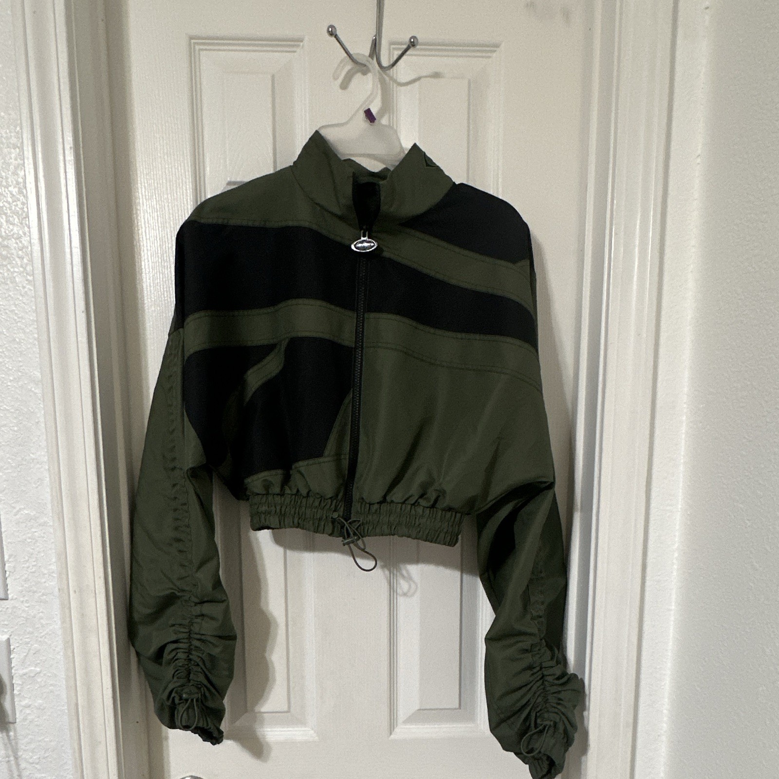 Reebok Women’s Cardi B Woven Crop Jacket Hunter Green/ Black Colorway XS