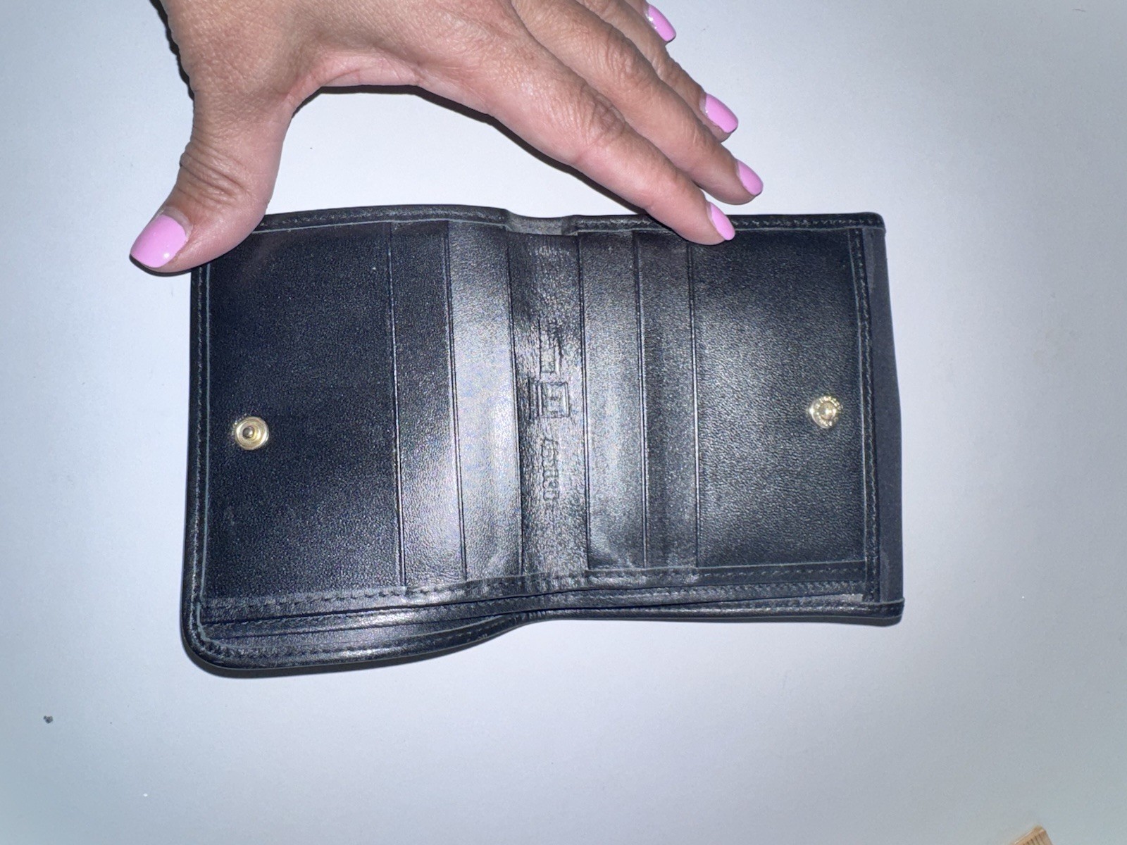Vintage Moschino compact wallet, specifically a collaboration with Redwall