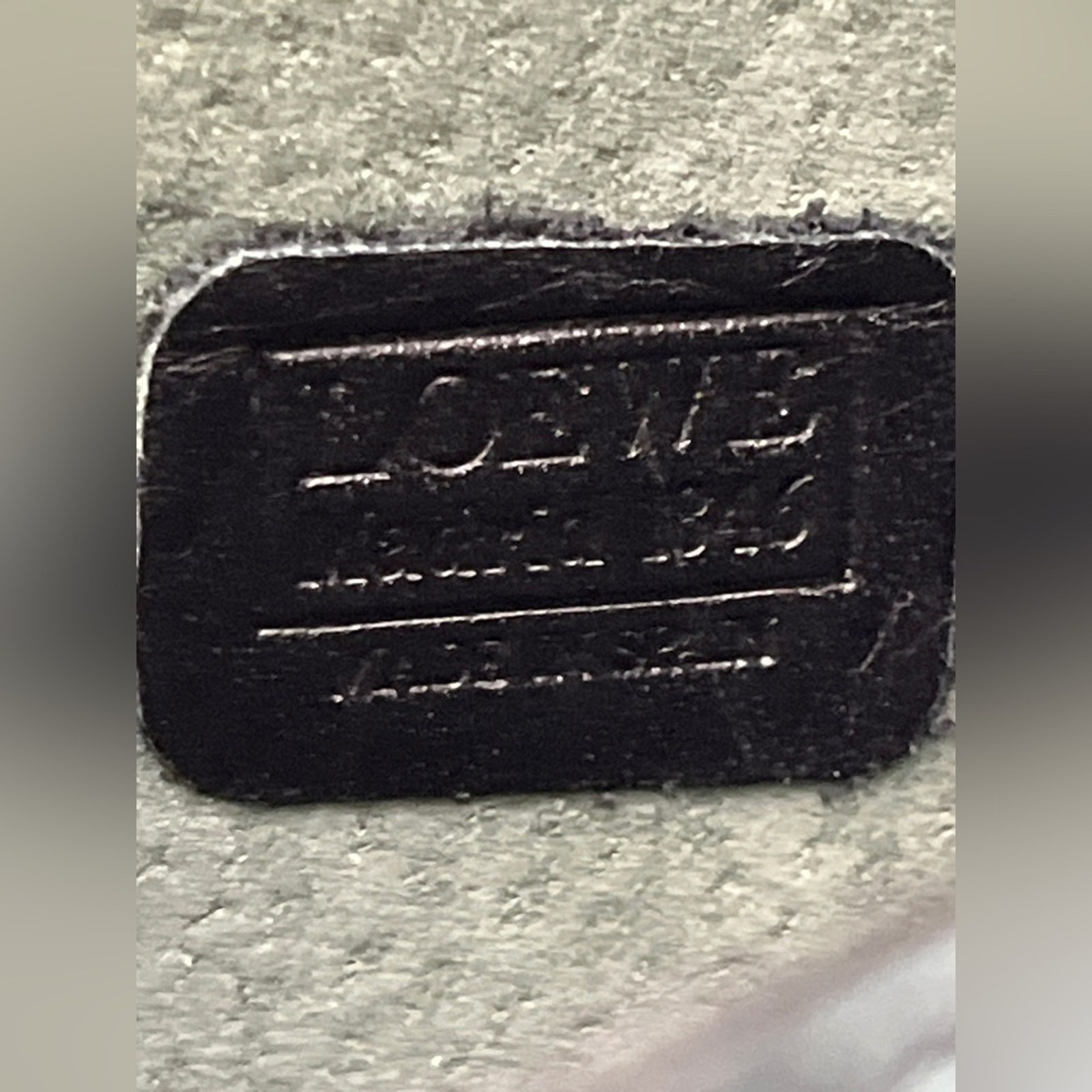 Loewe Anagram Clutch Black Leather Sleek Minimalist Spanish Designer Luxury