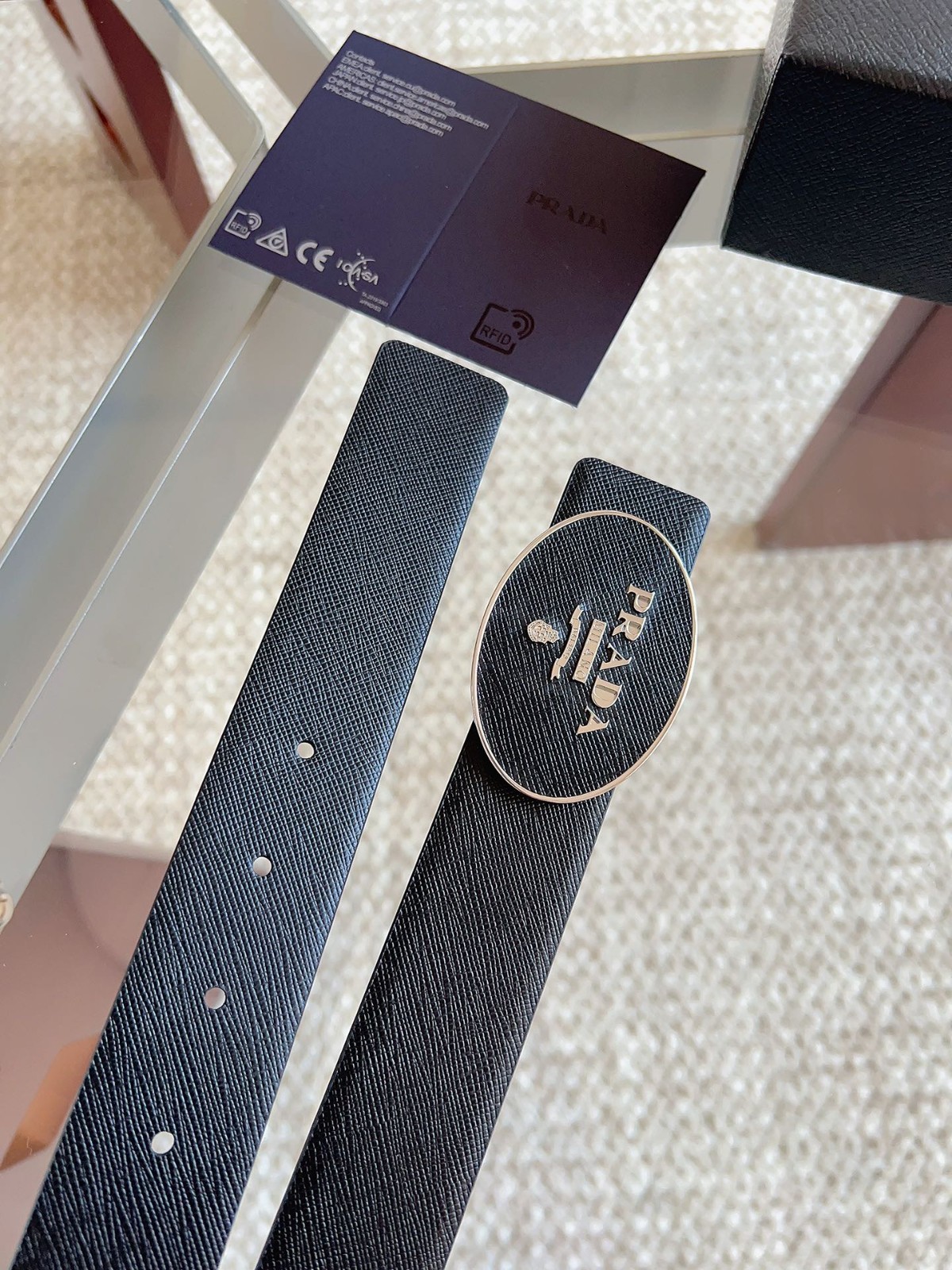 Prada men’s black-button black leather belt