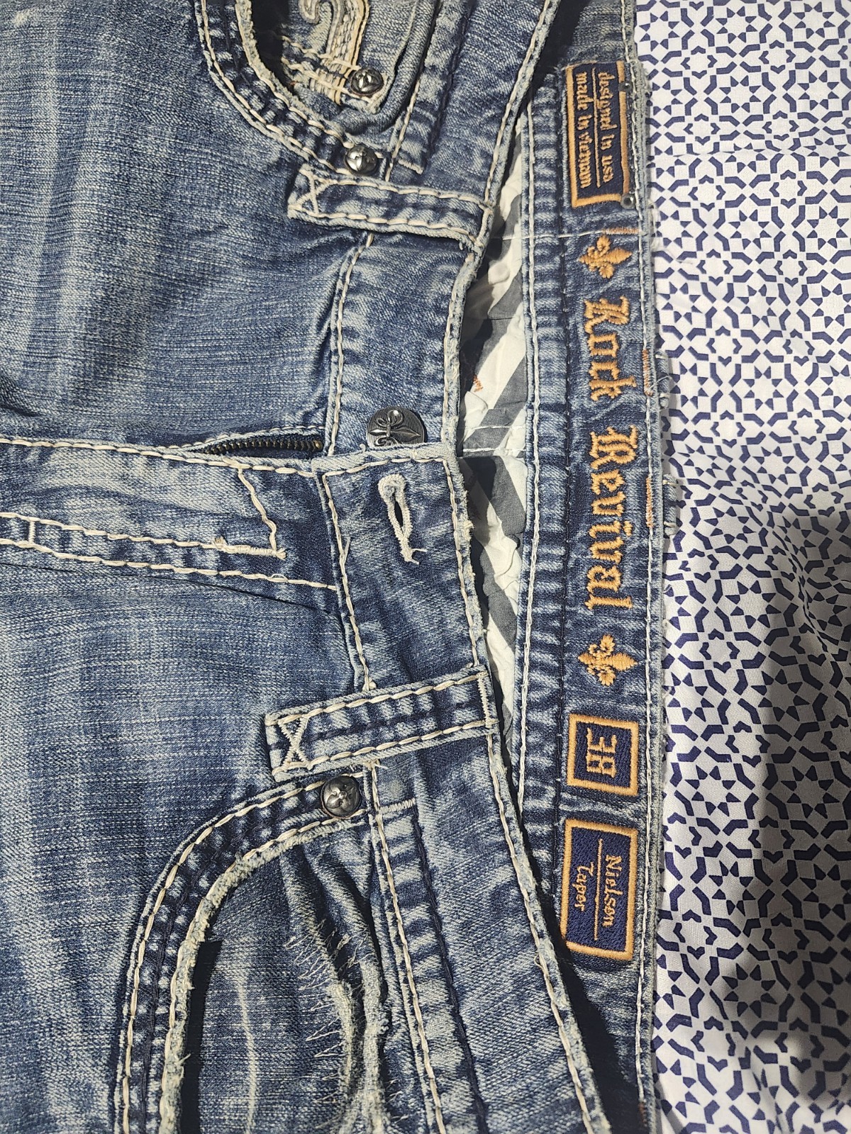 Rock Revival Men’s Medium Wash Blue Distressed Taper Jeans Embroidered Logo