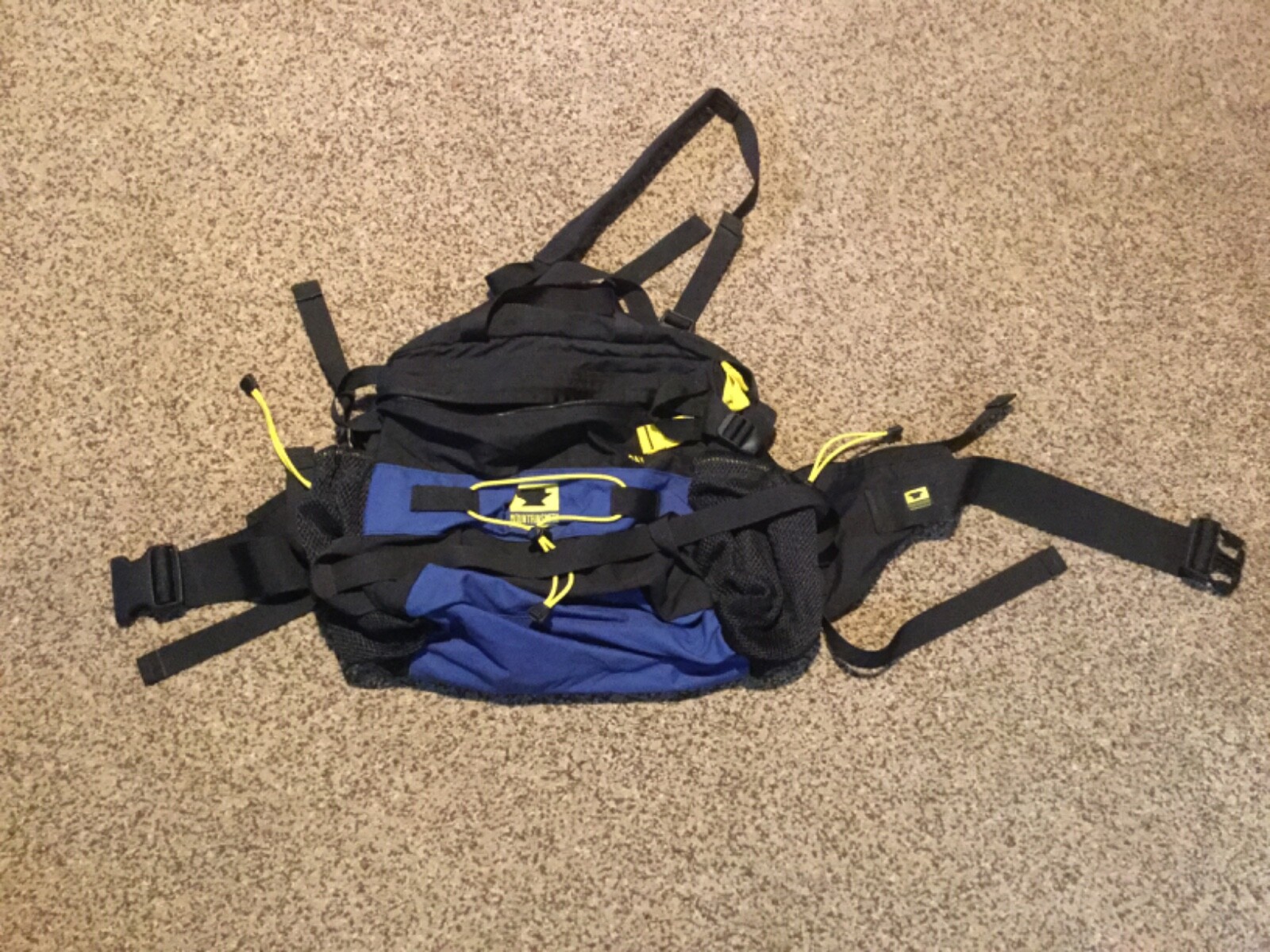 Pre Owned Mountainsmith Day Pack. Black. Blue, Yellow. 11” H x 11” L x 4” W.