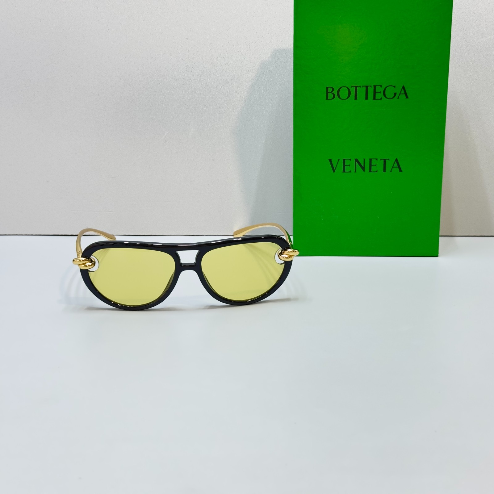 Bottega Veneta BV1418S Black Frame Yellow Lens Gold Knot Aviator Sunglasses