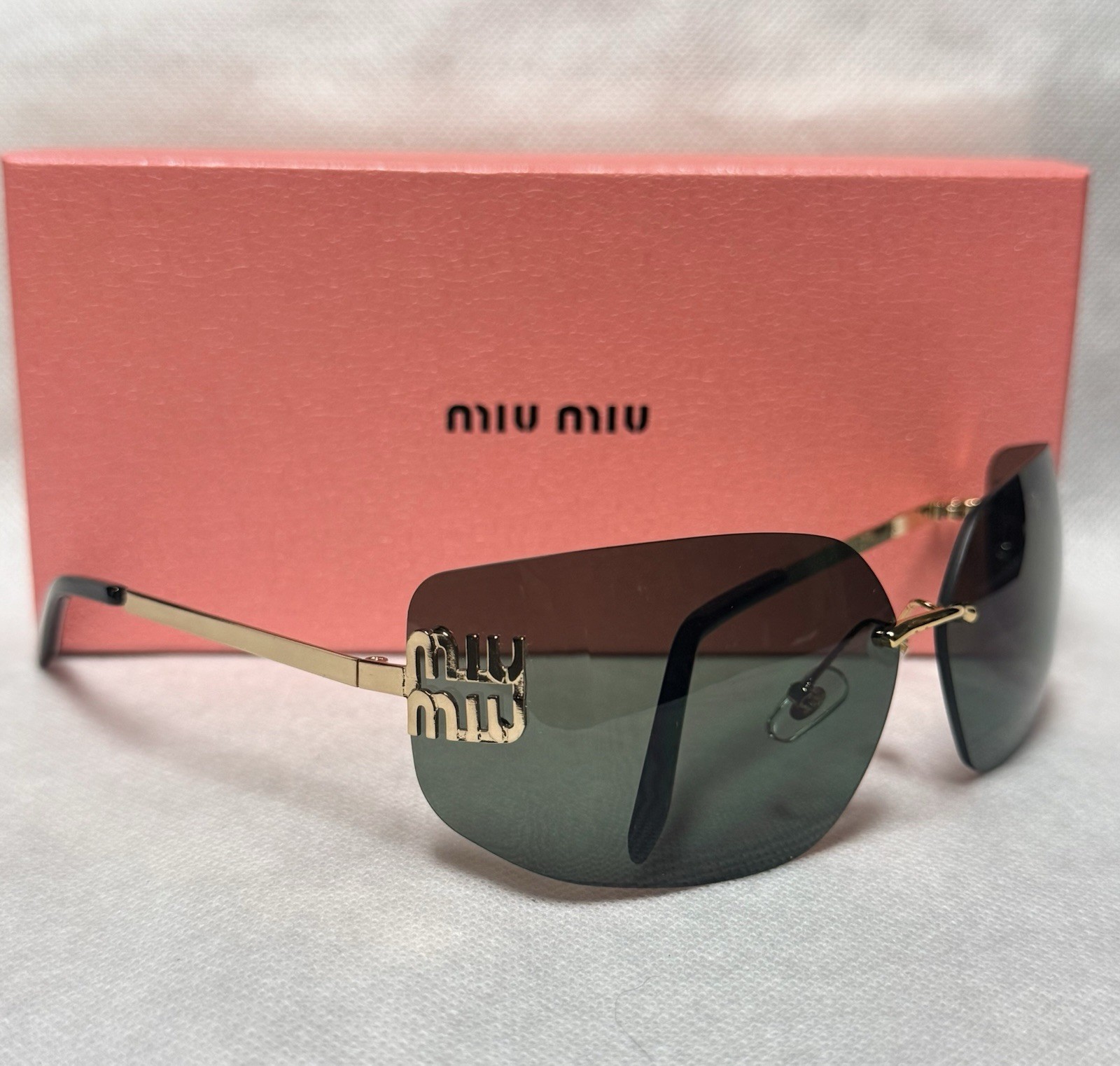 Miu Miu Women’s Rimless Shield Sunglasses Gold Metal Frame Green Gradient