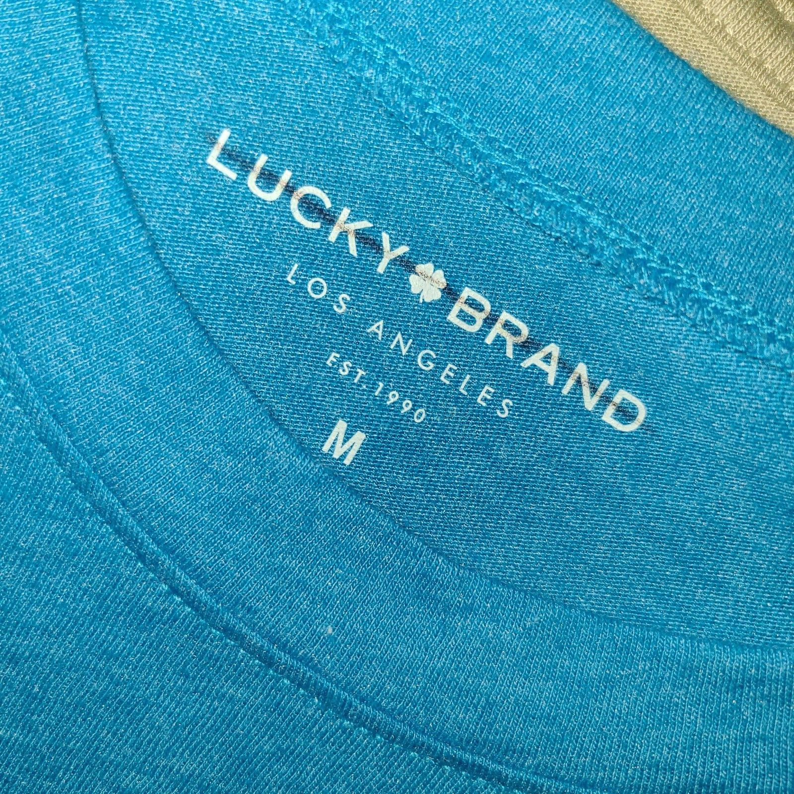 8601) NWOT LUCKY BRAND medium crew neck tee blue logo short sleeve cotton new