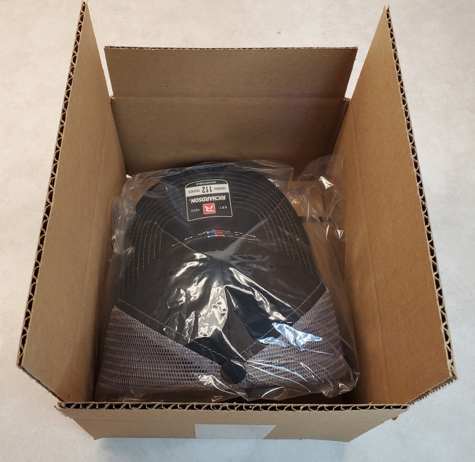 Kubota Tractor Emb. Patch on Richardson 112 Trucker Hat Snapback Black/Black